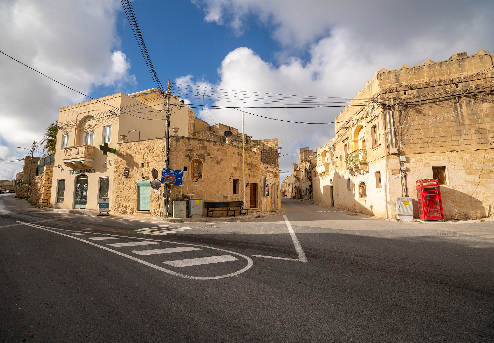 british phone booth on streets of gozo island, malta