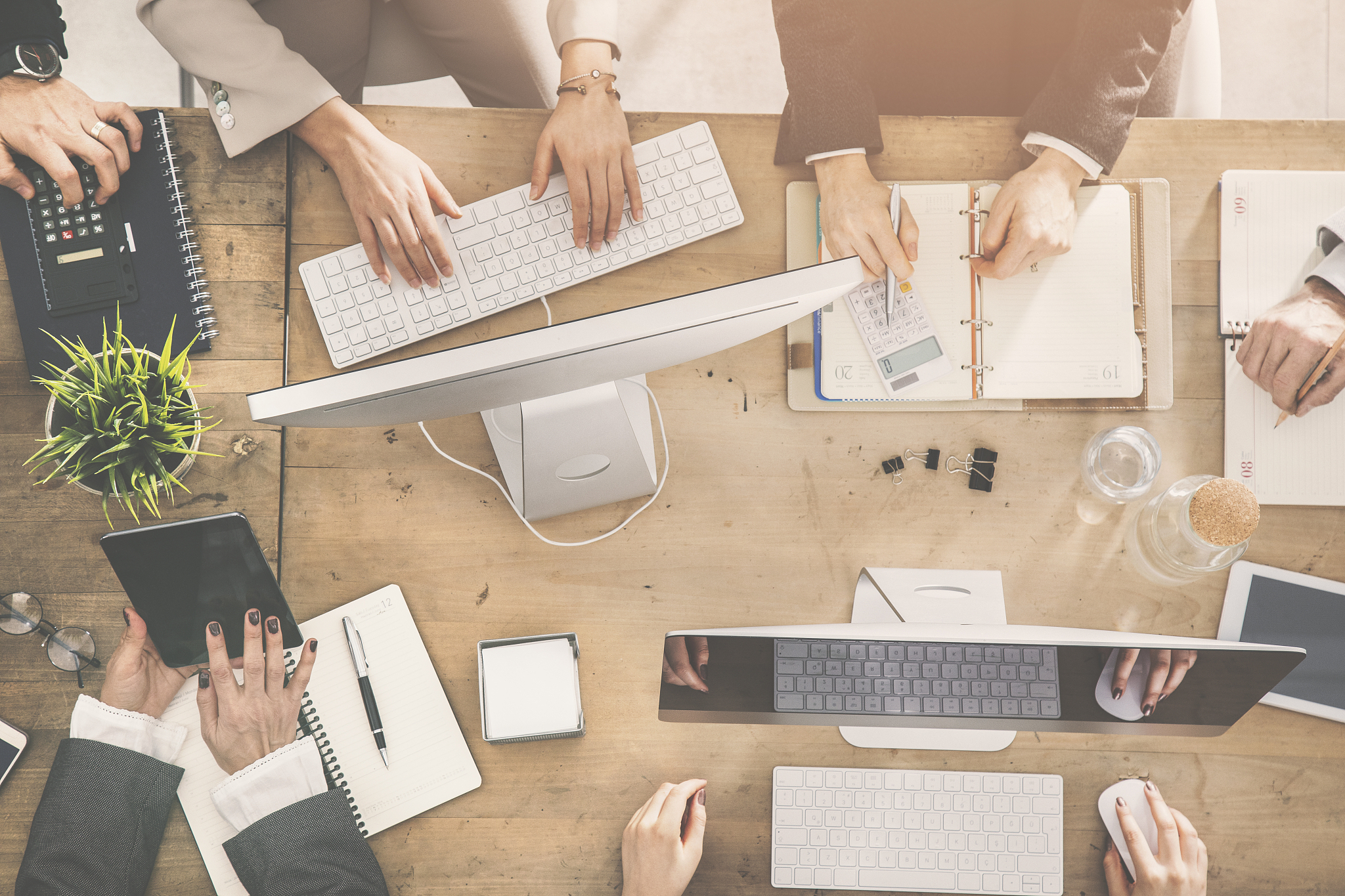 people working around a table