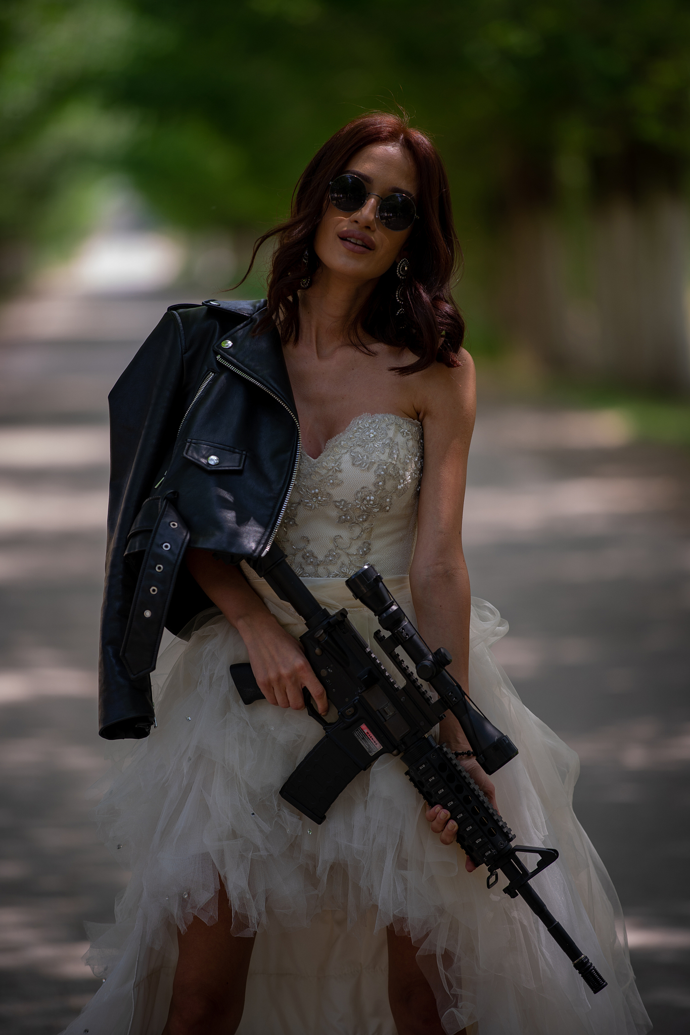 bride and groom with guns