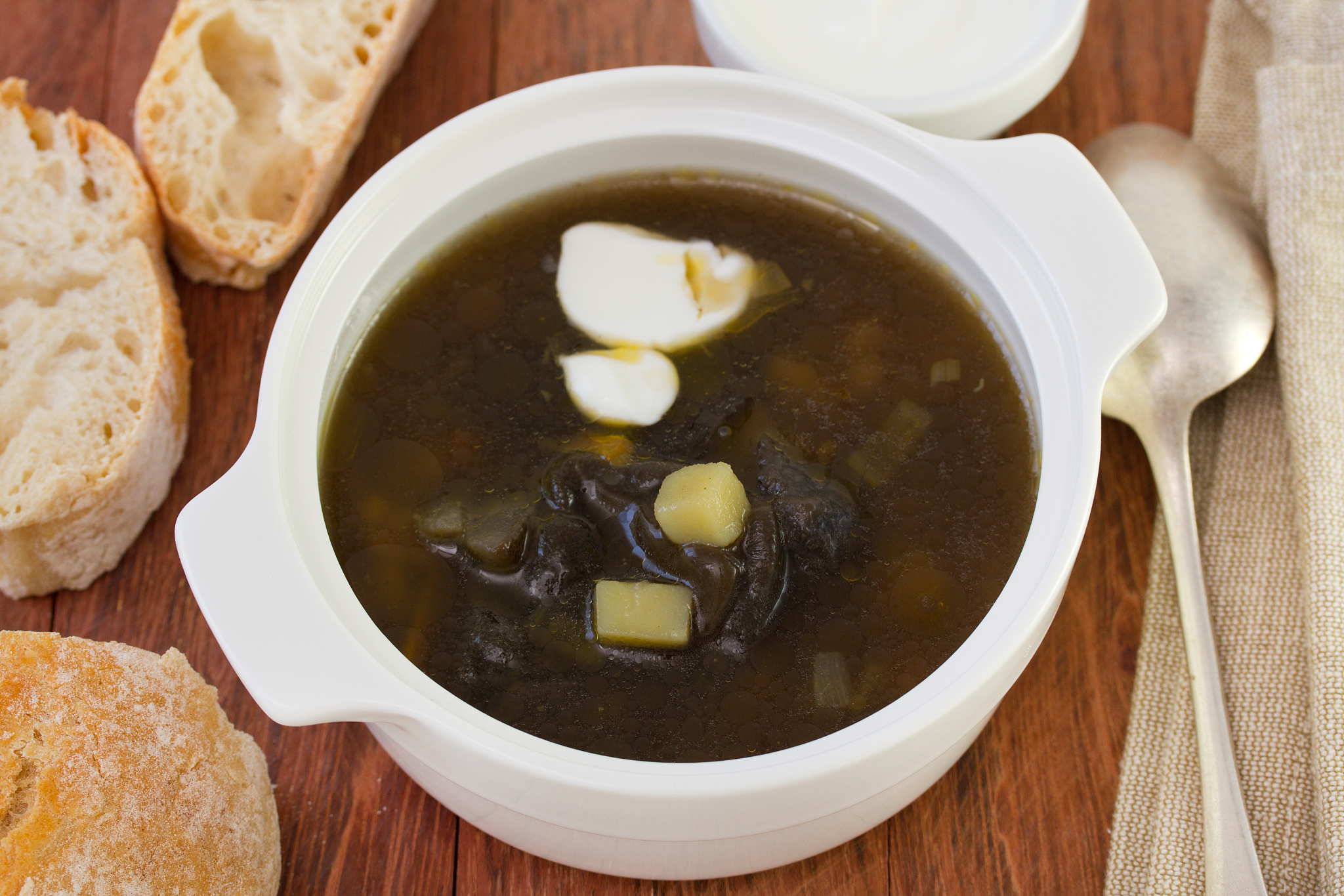 mushroom soup with cream in white bowl