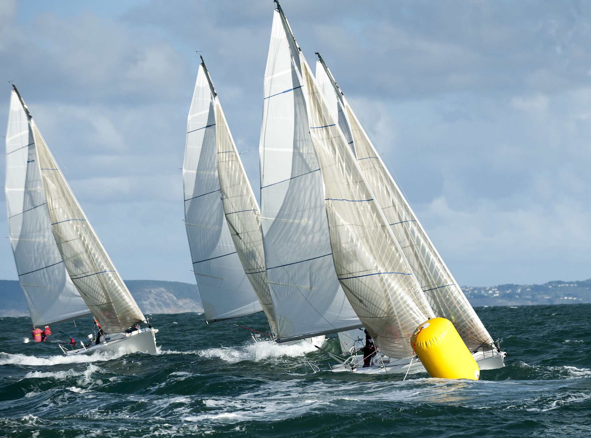 yacht on buoy at regatta