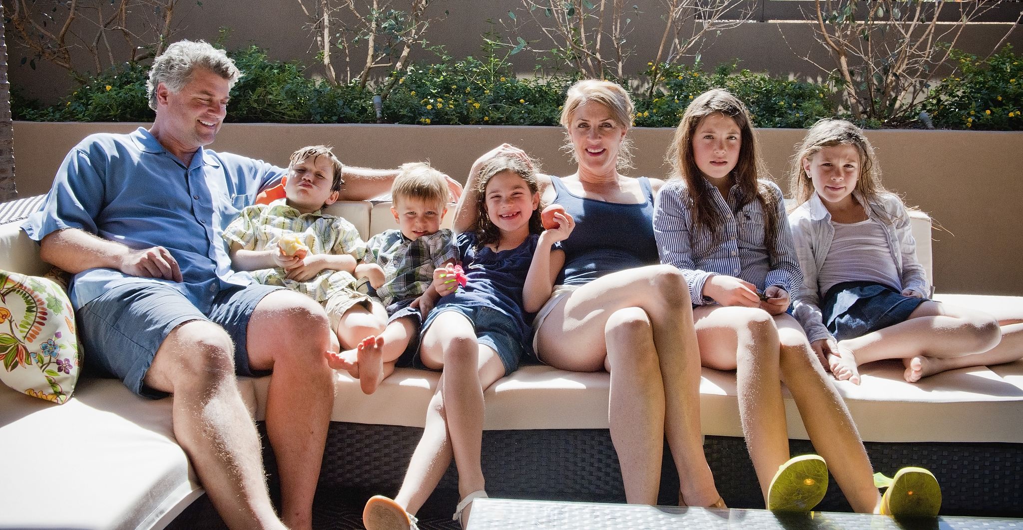 family, outdoor portrait in the morning sun