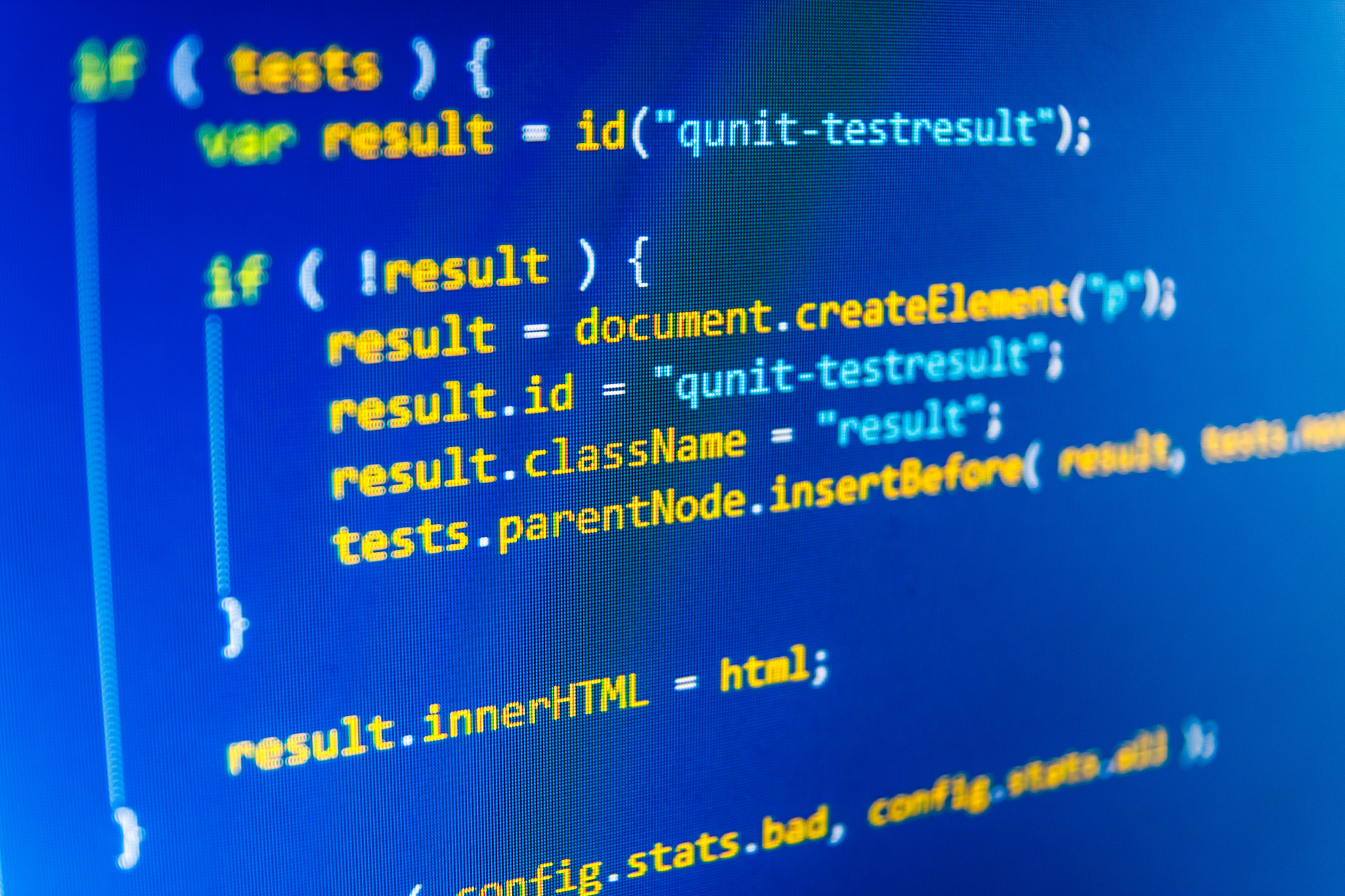 software developer programming code on computer