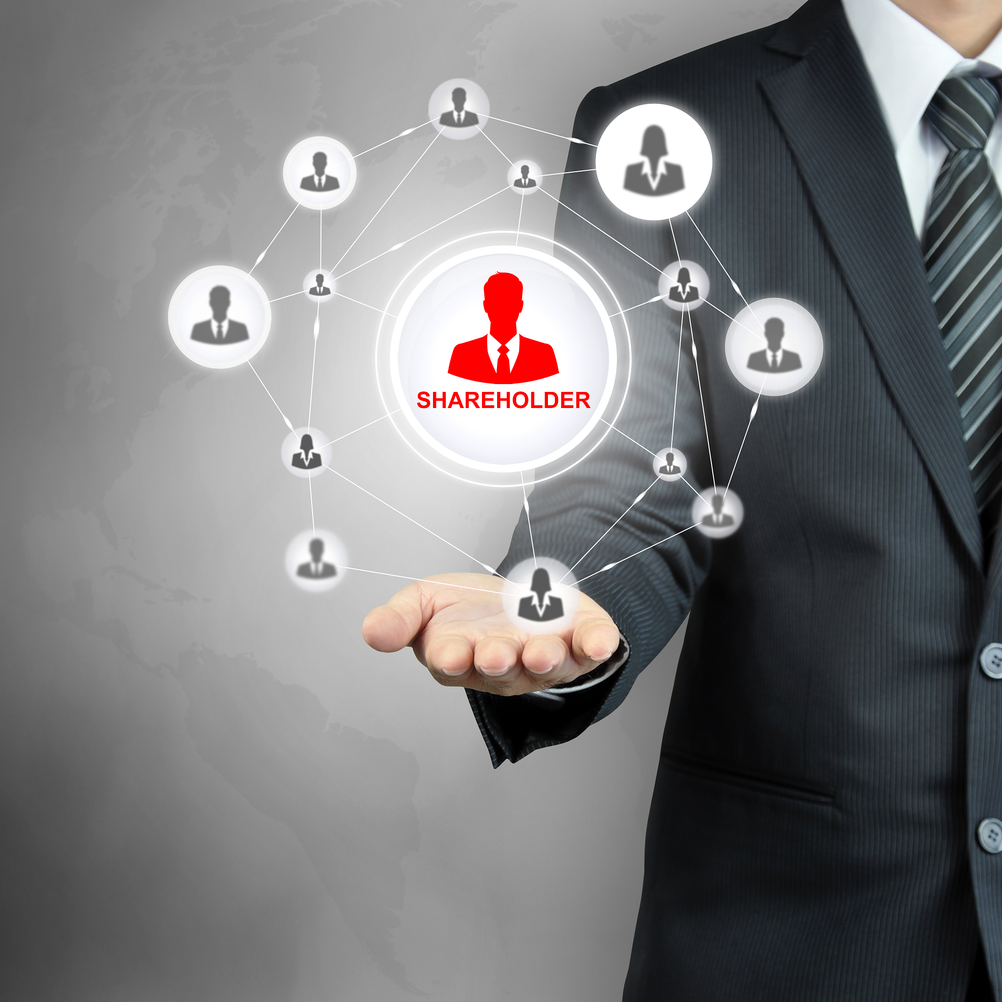 shareholder sign on businessman hand