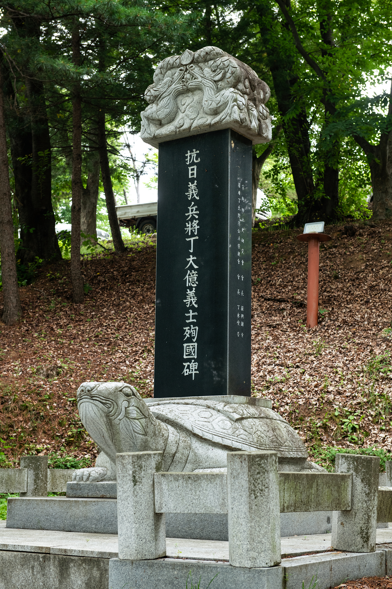 traditional memorial stone at historical site in the nature
