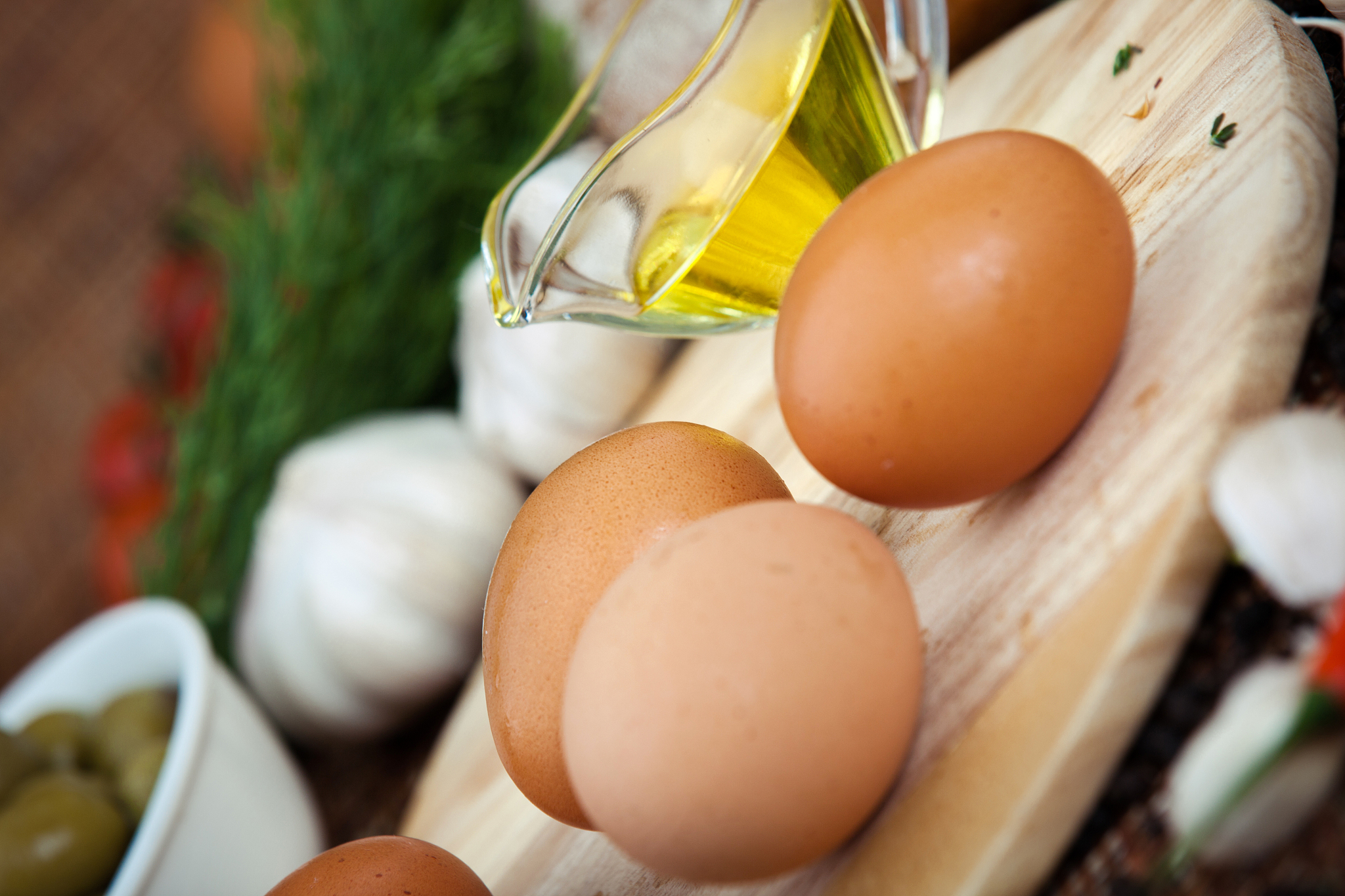 eggs and ingredients on cutting board