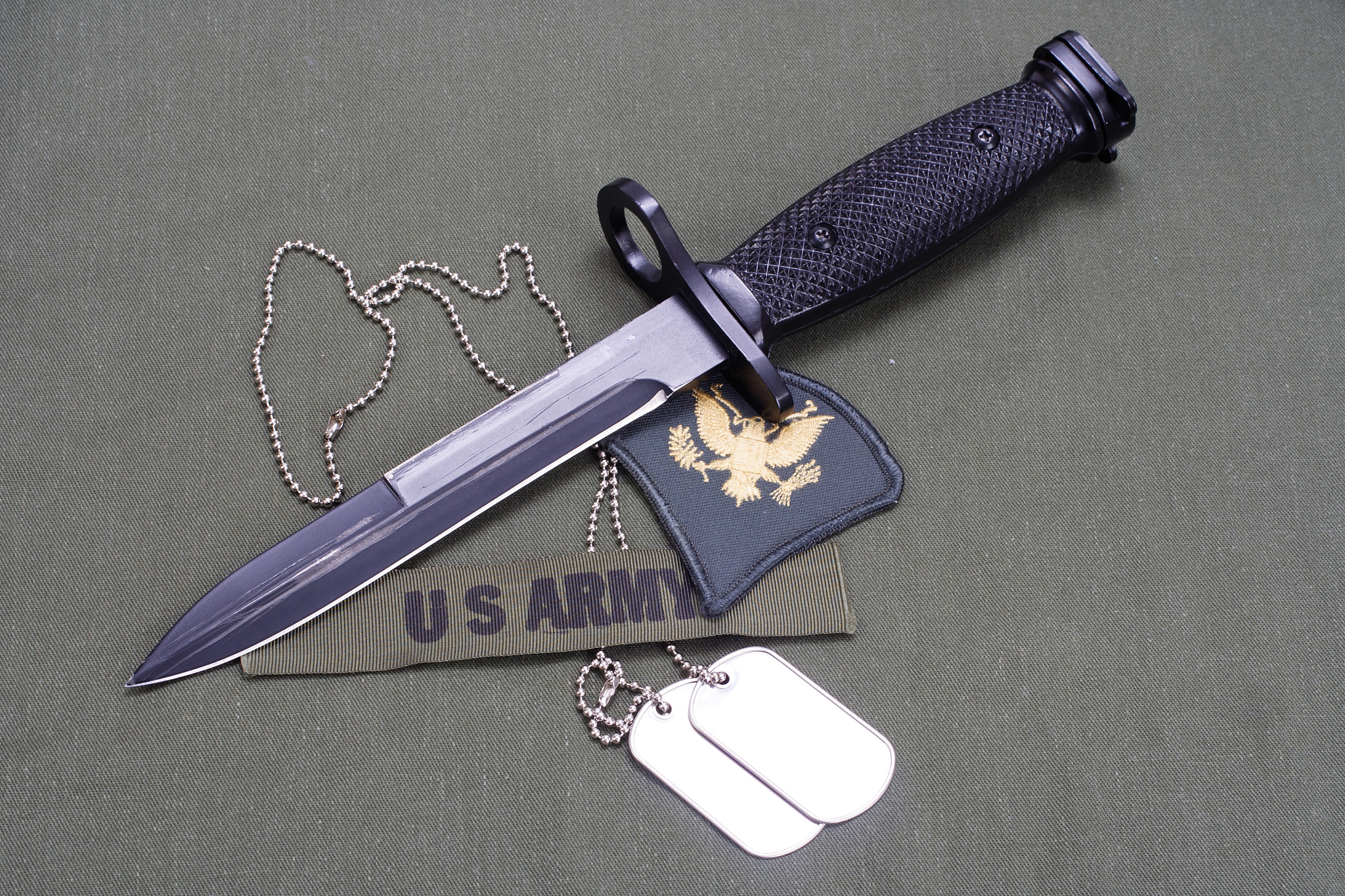bayonet on us army uniform background
