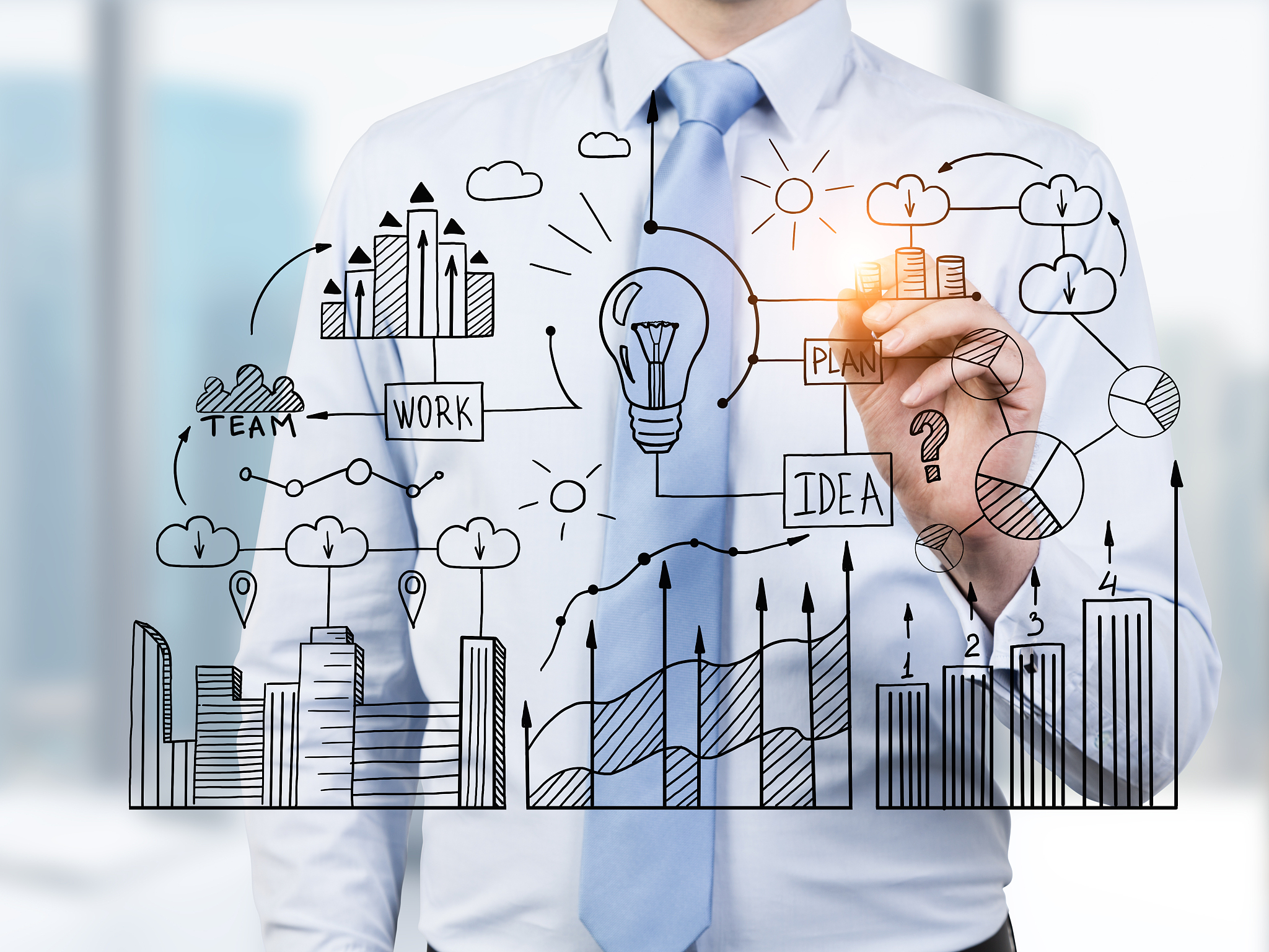 man in blue drawing business diagram