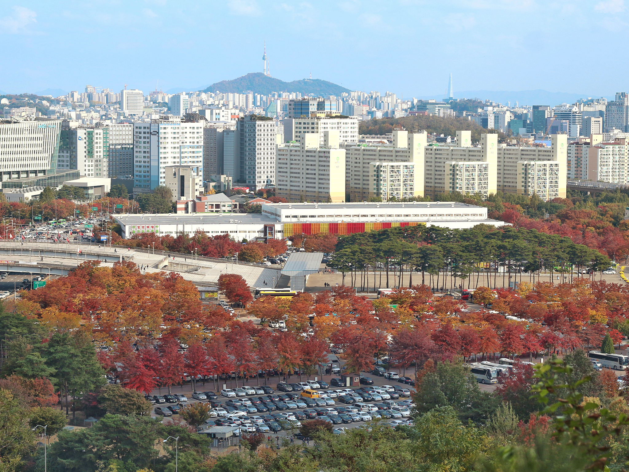 high angle view of trees and buildings against sky