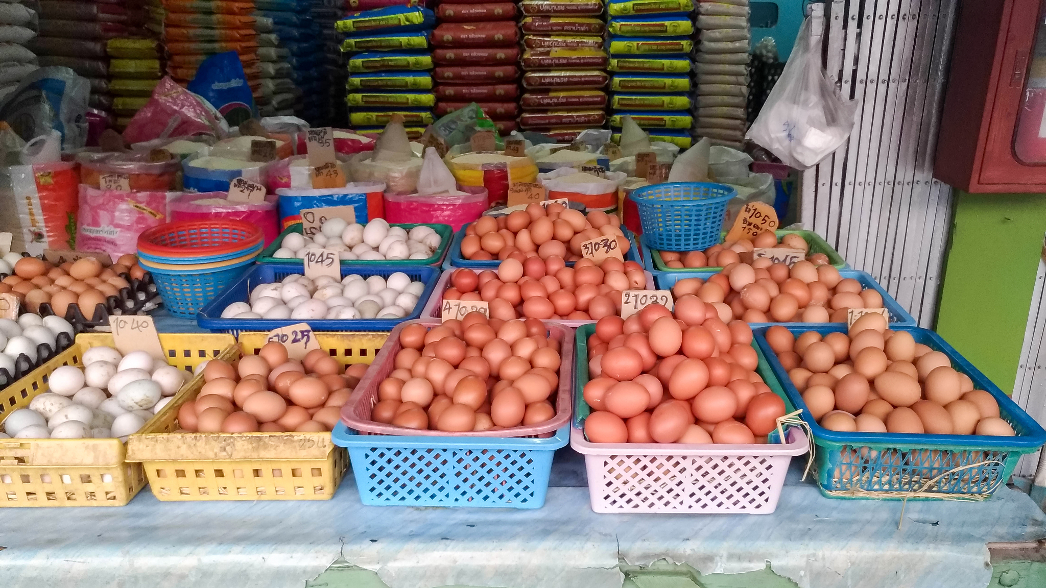 many eggs are stacked in the shop.