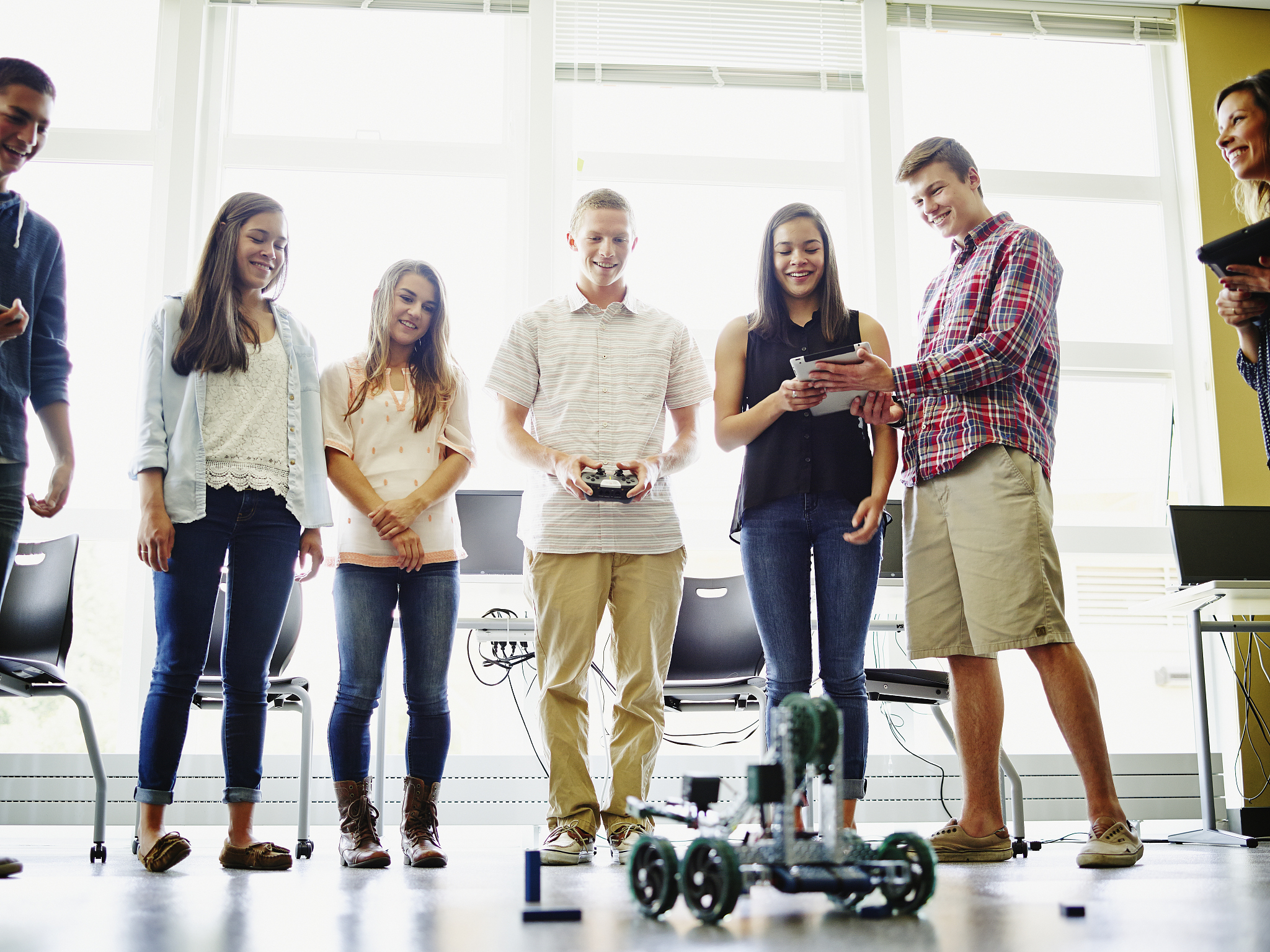 Should Robots Replace University Lecturers? Ethical, Social, and Educational Implications