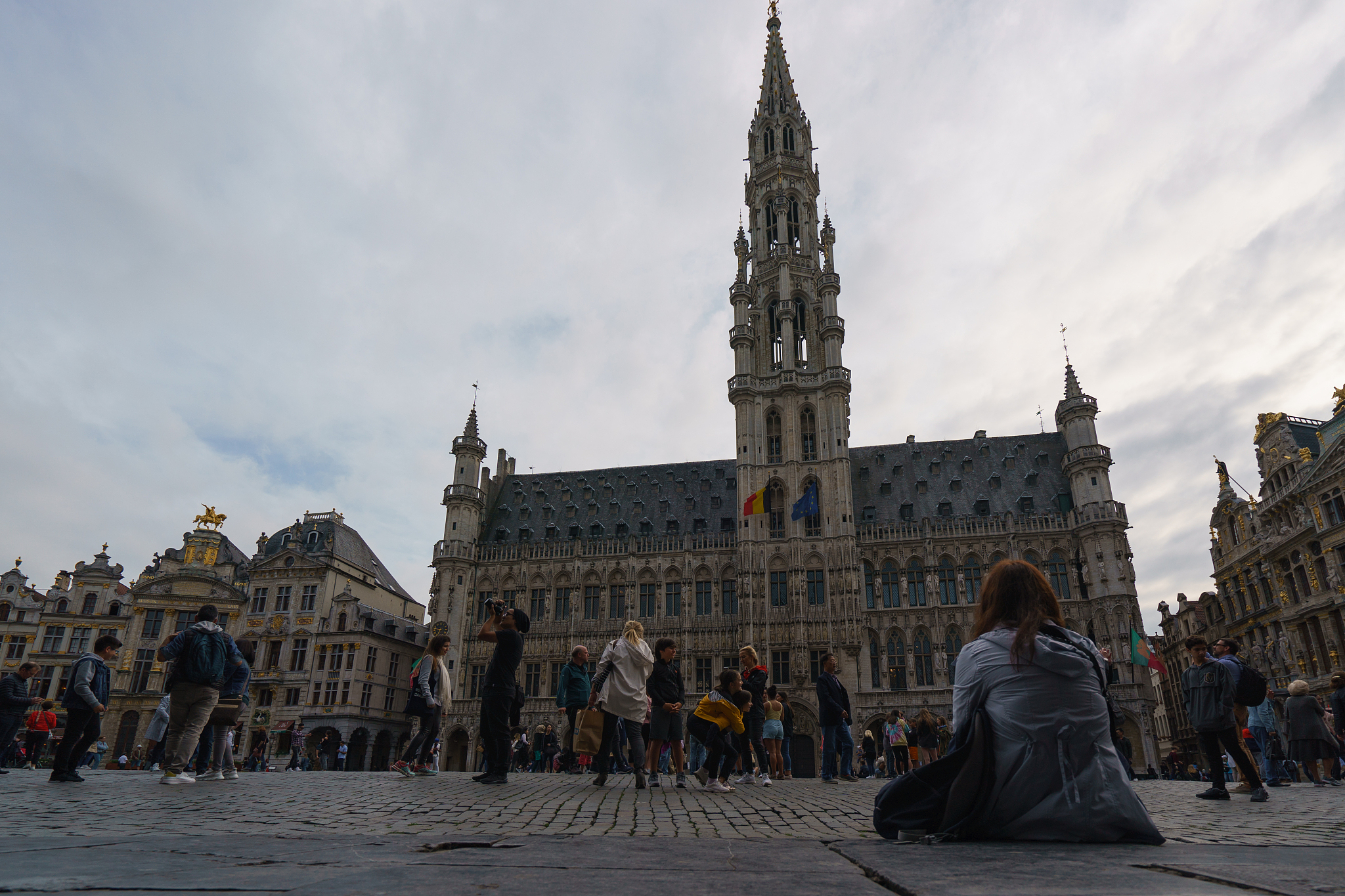 tourists at the grand place in brussels