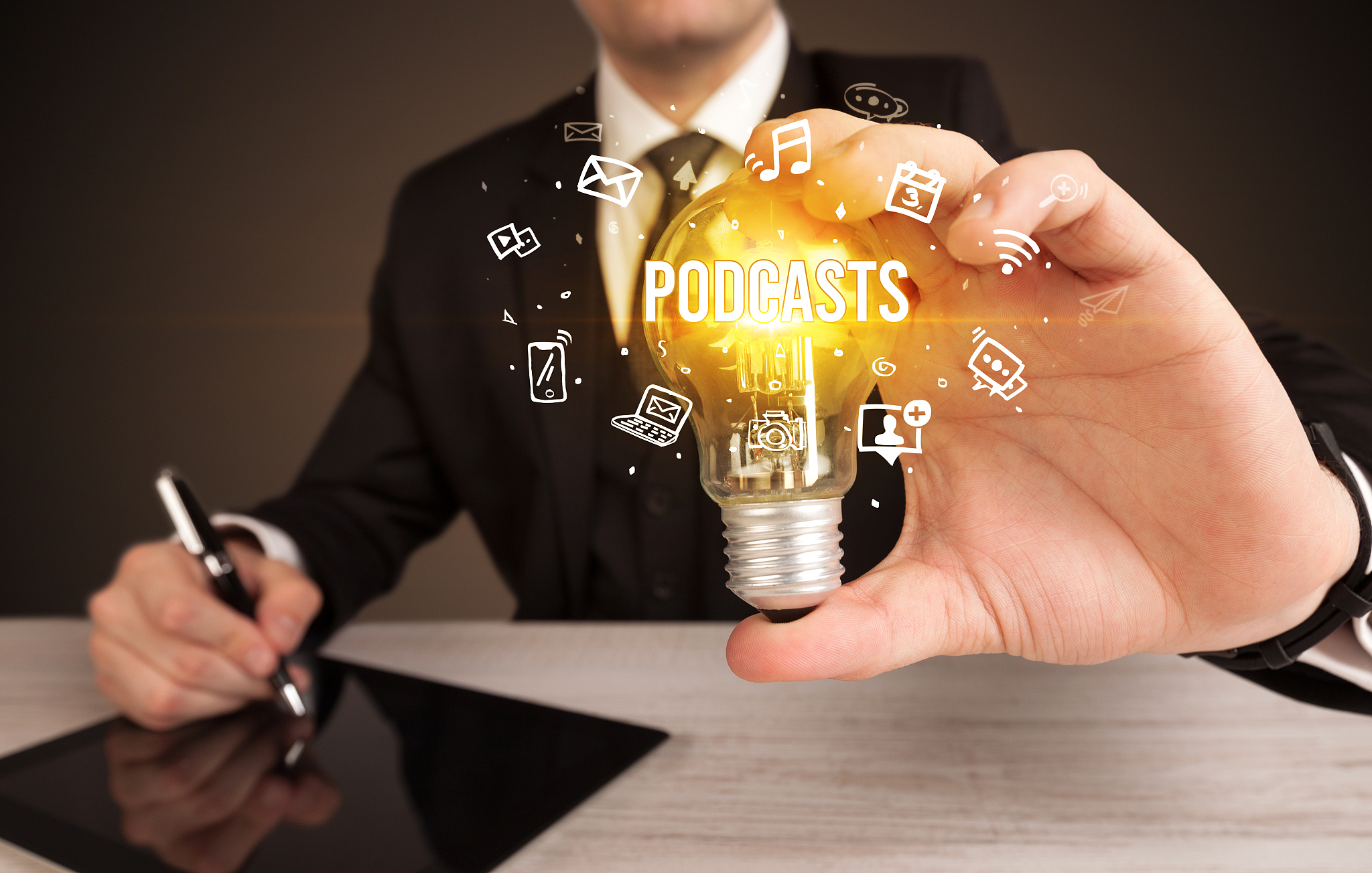 businessman holding a light bulb, social media concept