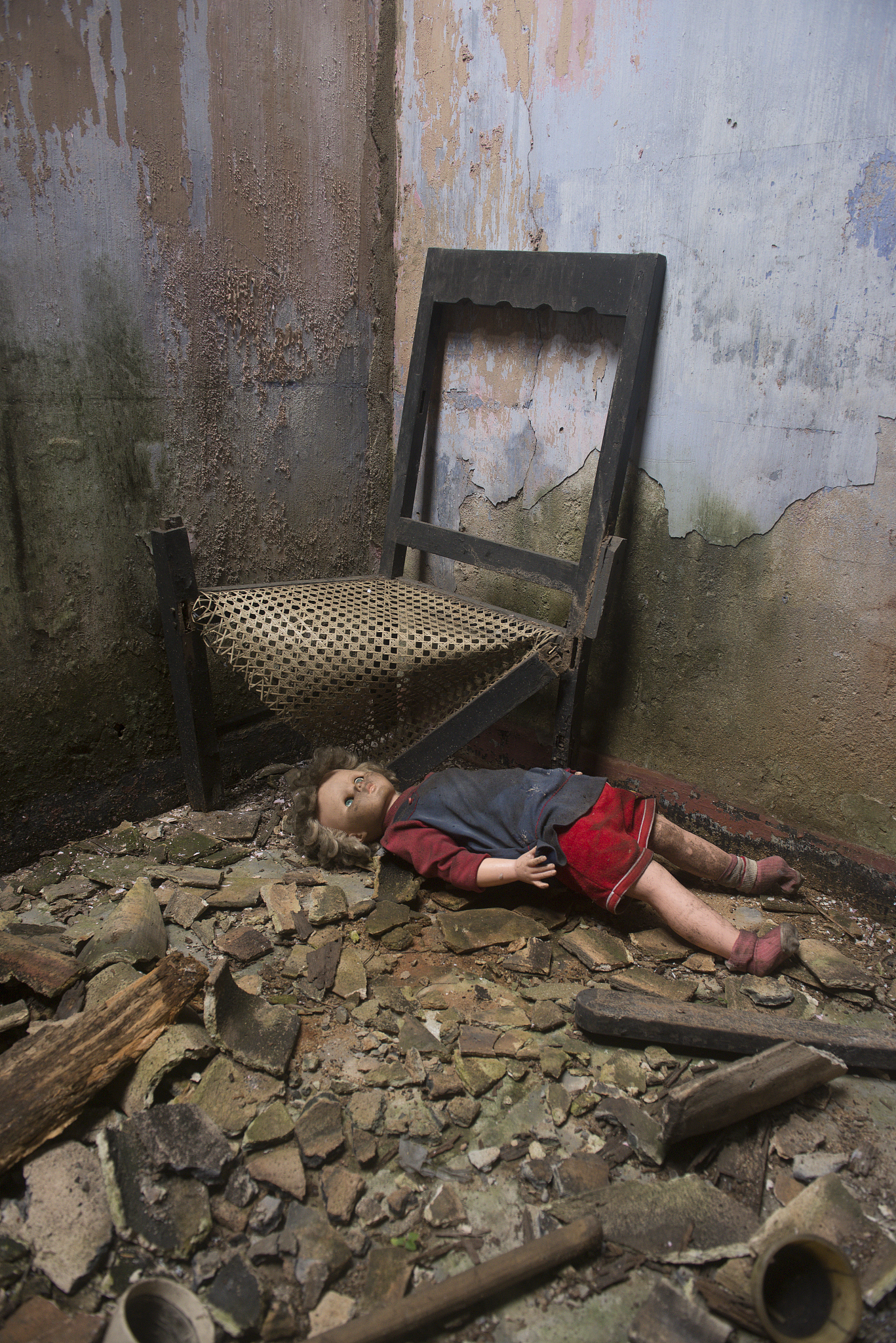 doll in an abondoned house