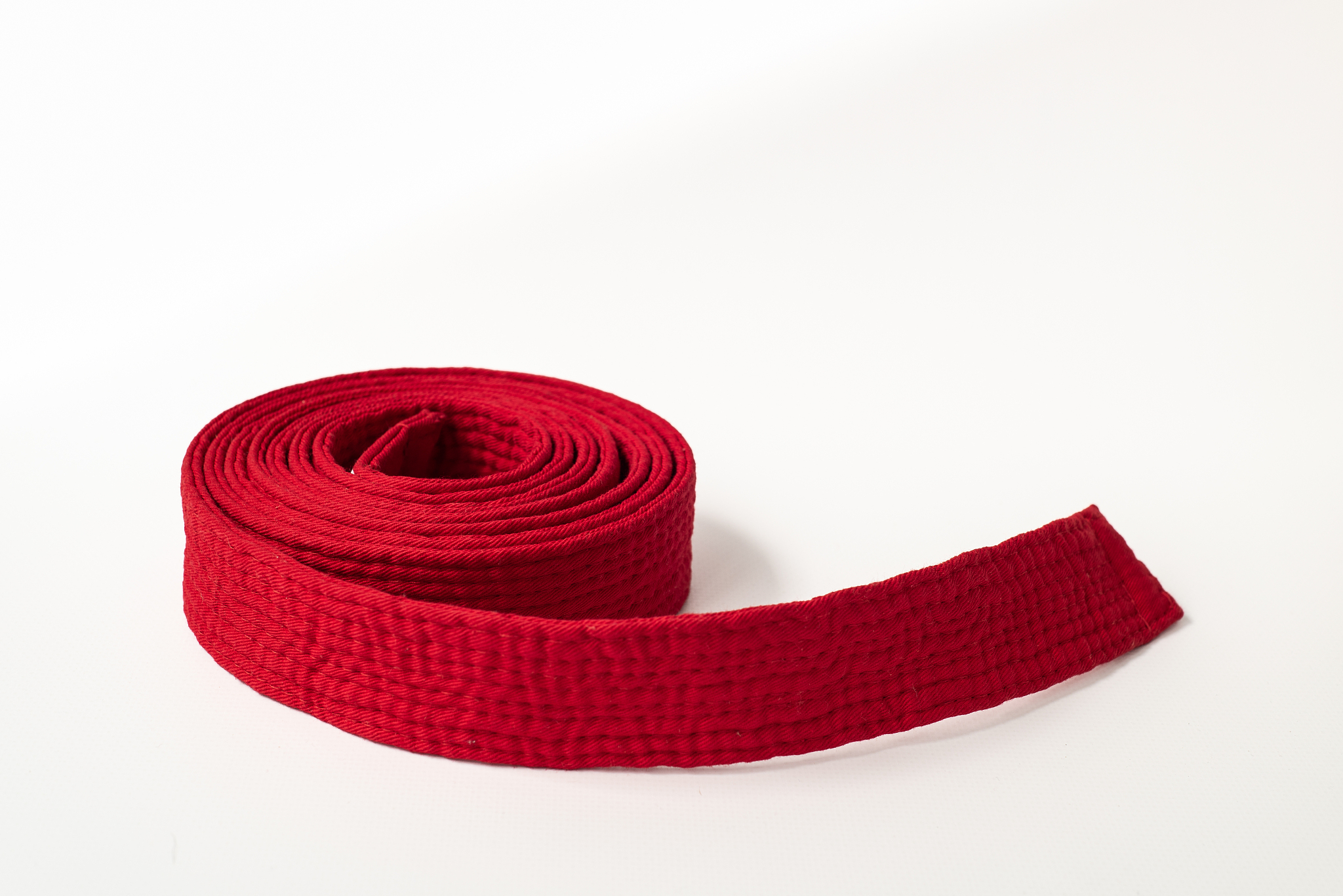 zen art. red belt martial arts on white background. clothes for 