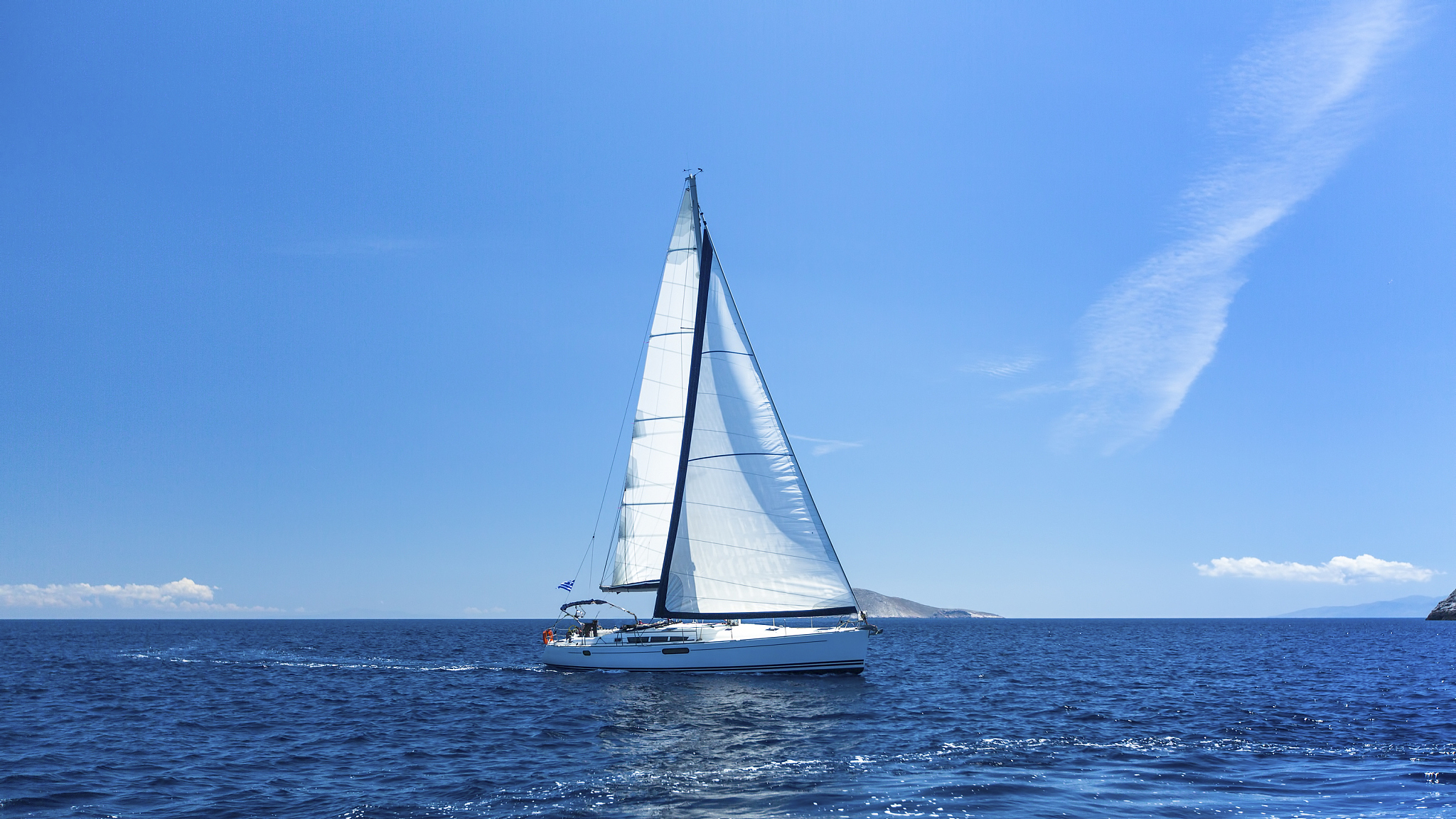 sailing off the coast of greece. luxury yachts.
