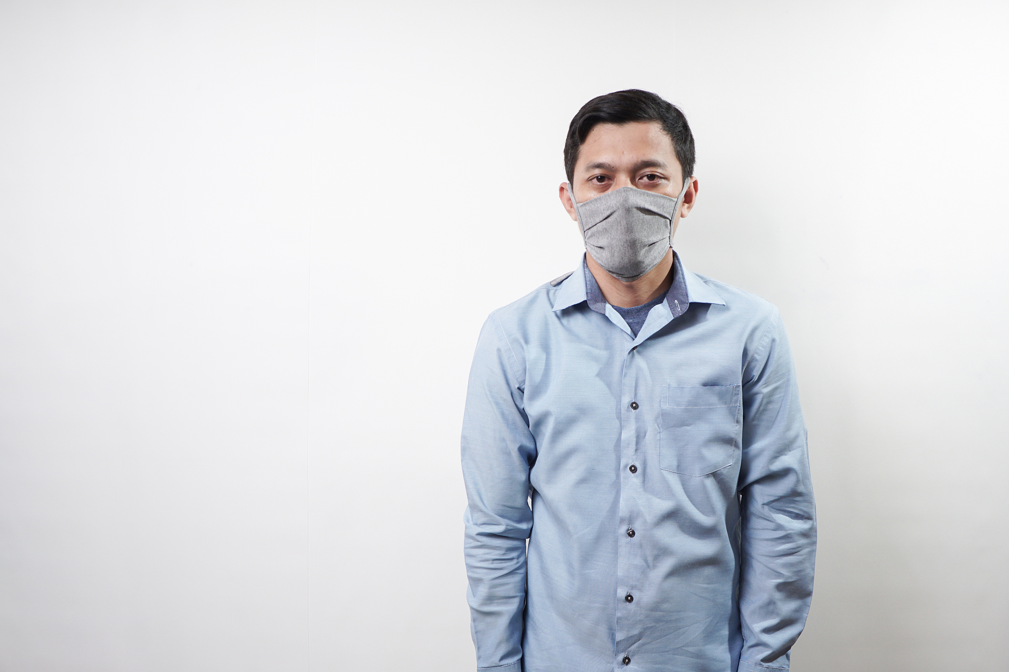 businessman with cloth face mask during covid-19 pandemic