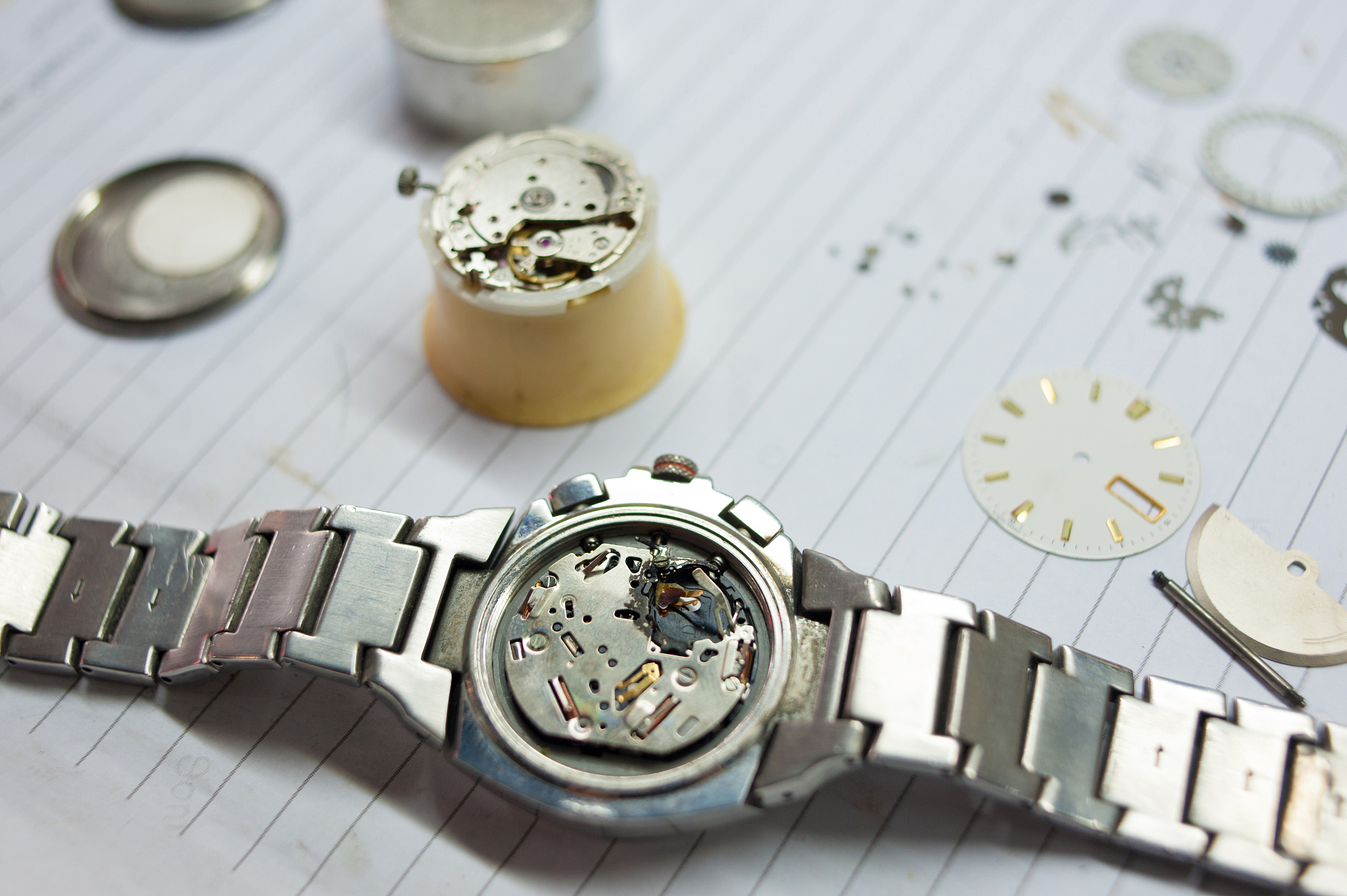 detail of watch machinery on the table.