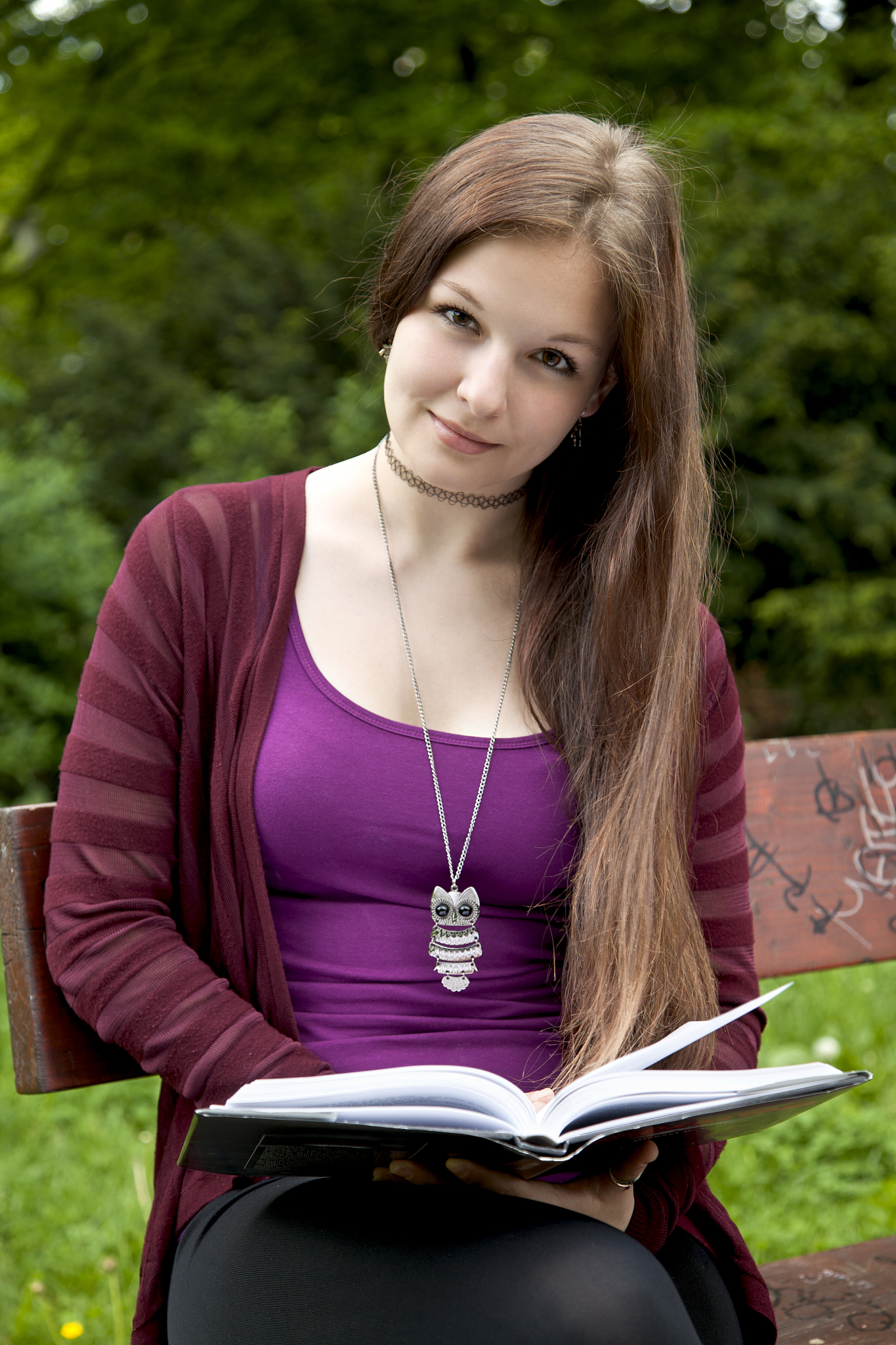 young woman reading a book