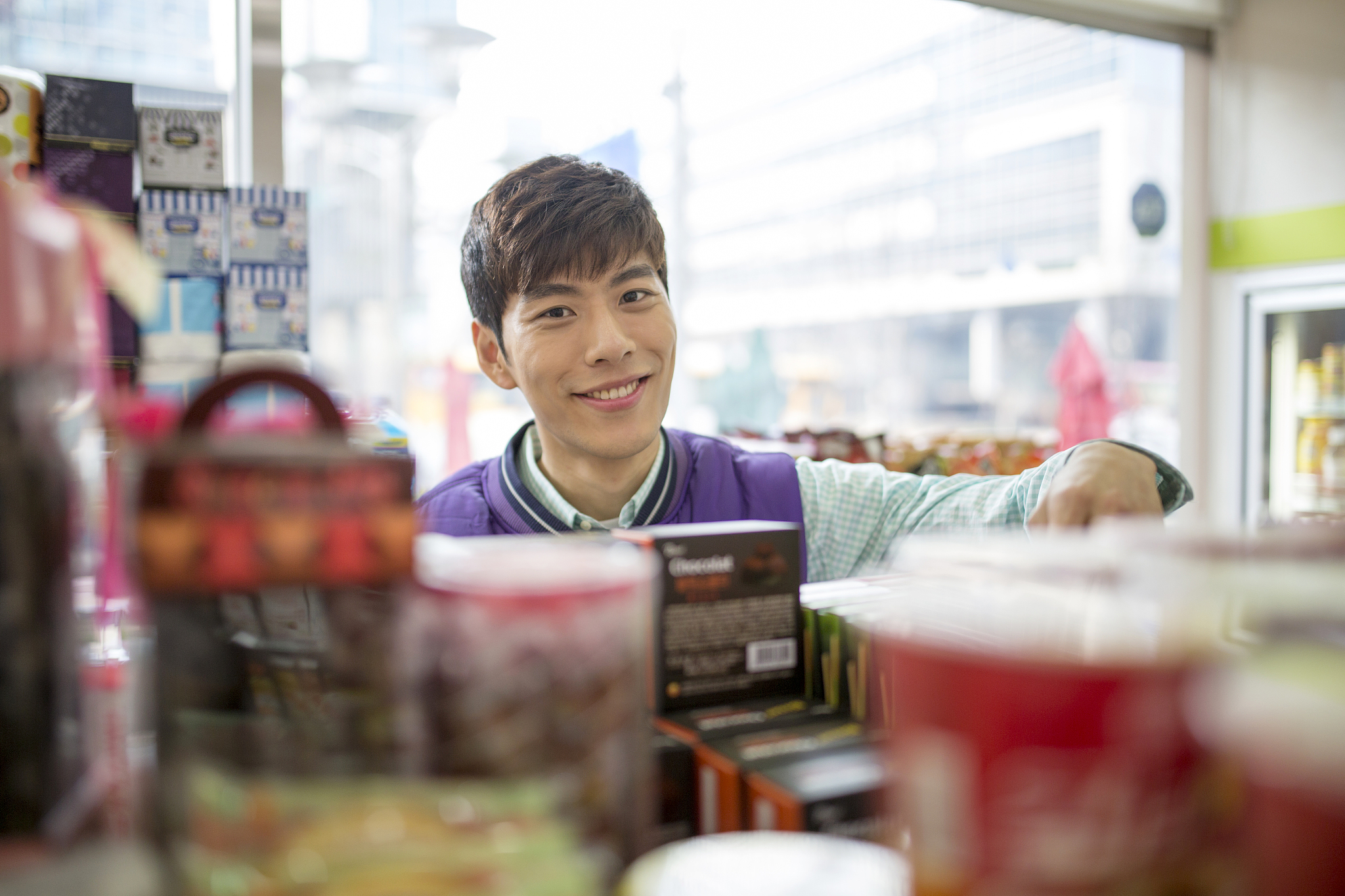 man working at convenience store