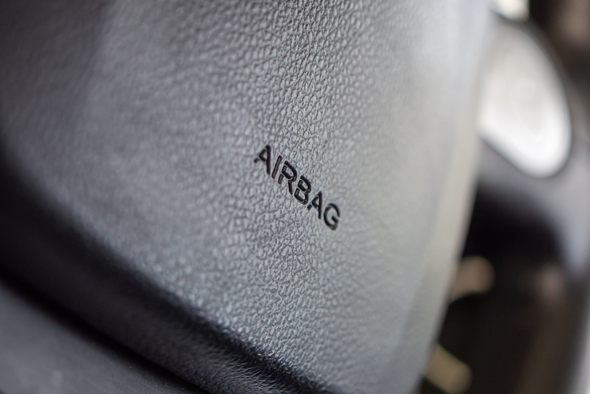 safety airbag sign on car steering wheel