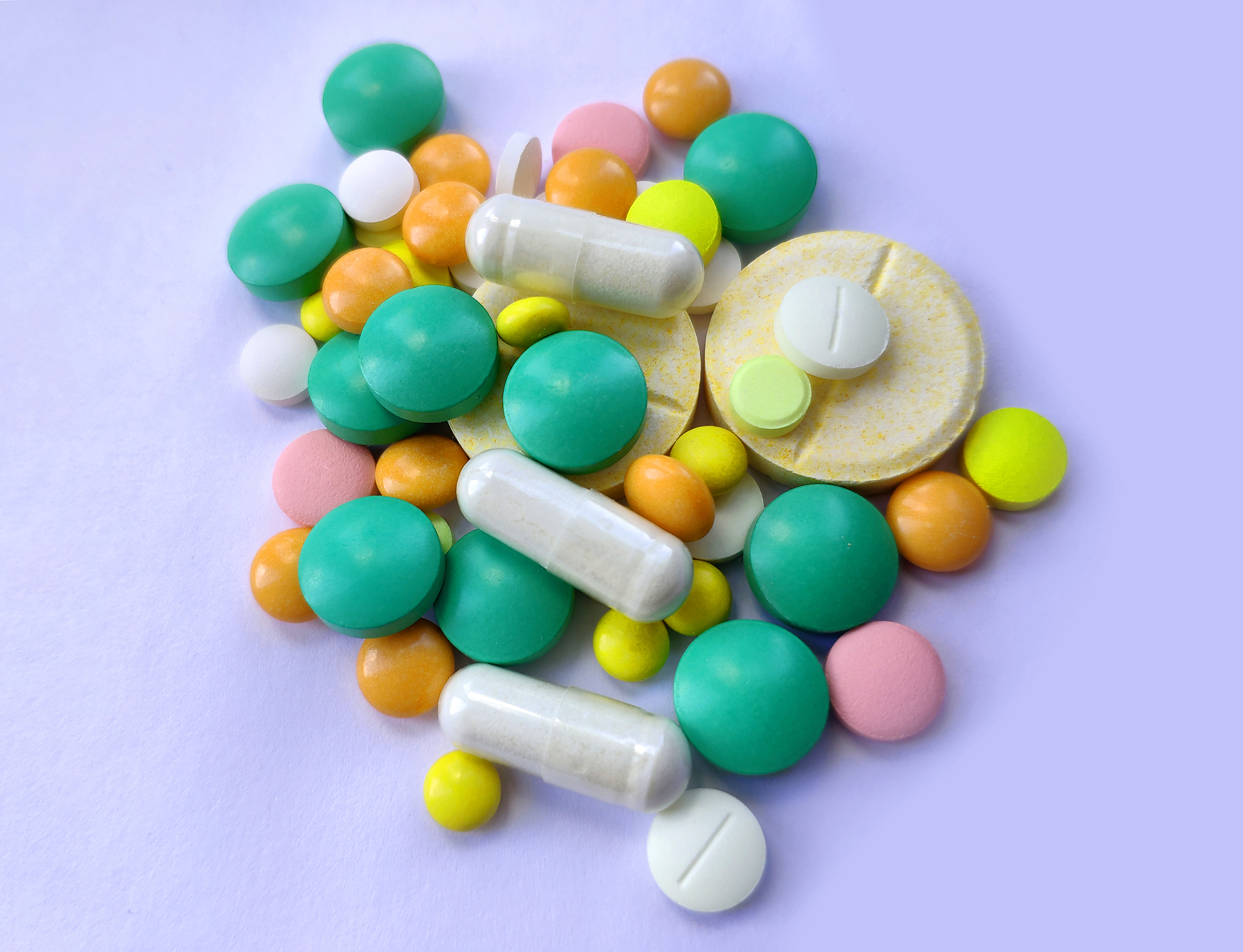 stack of colourful pills, medicine background