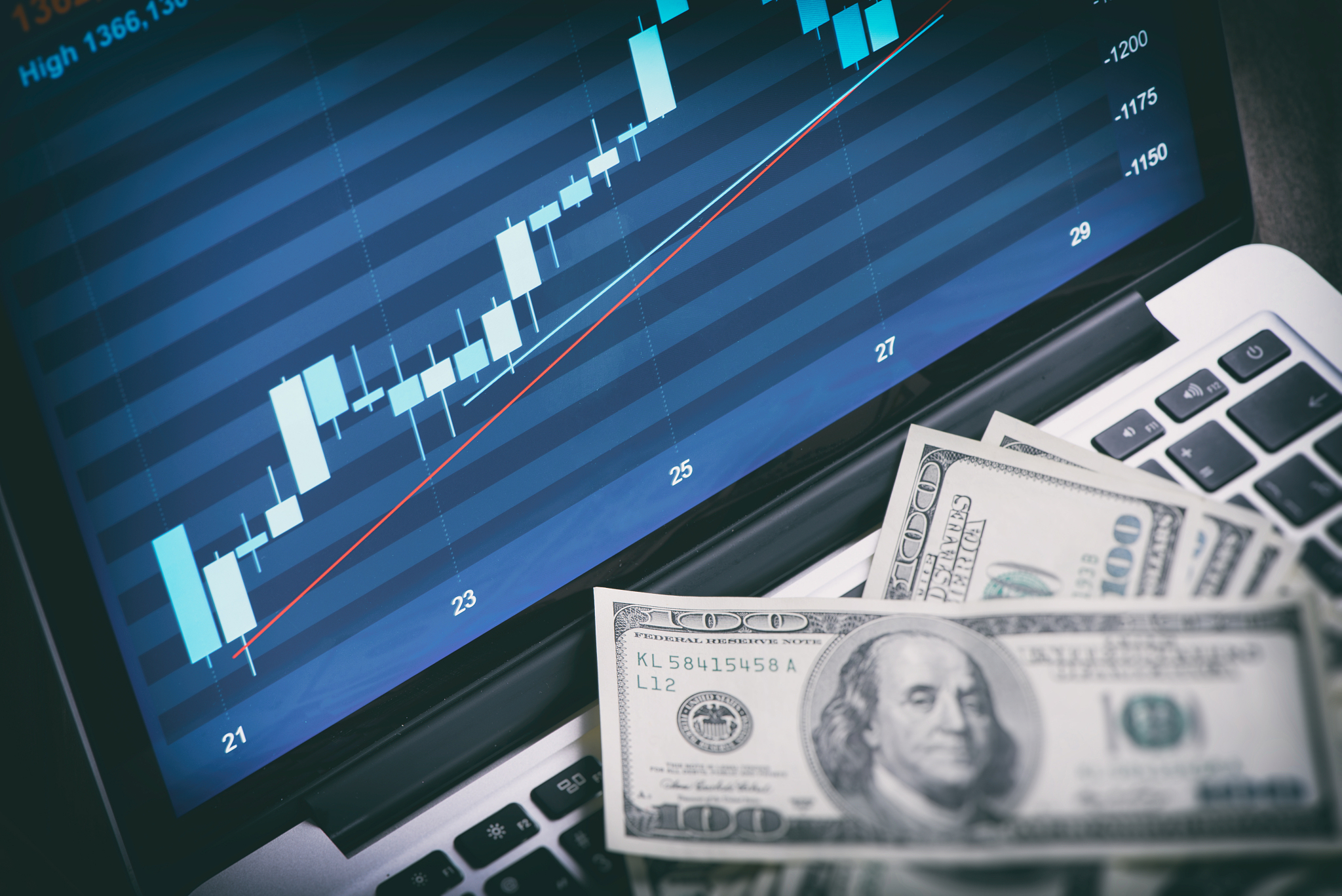 stock market graph on laptop screen