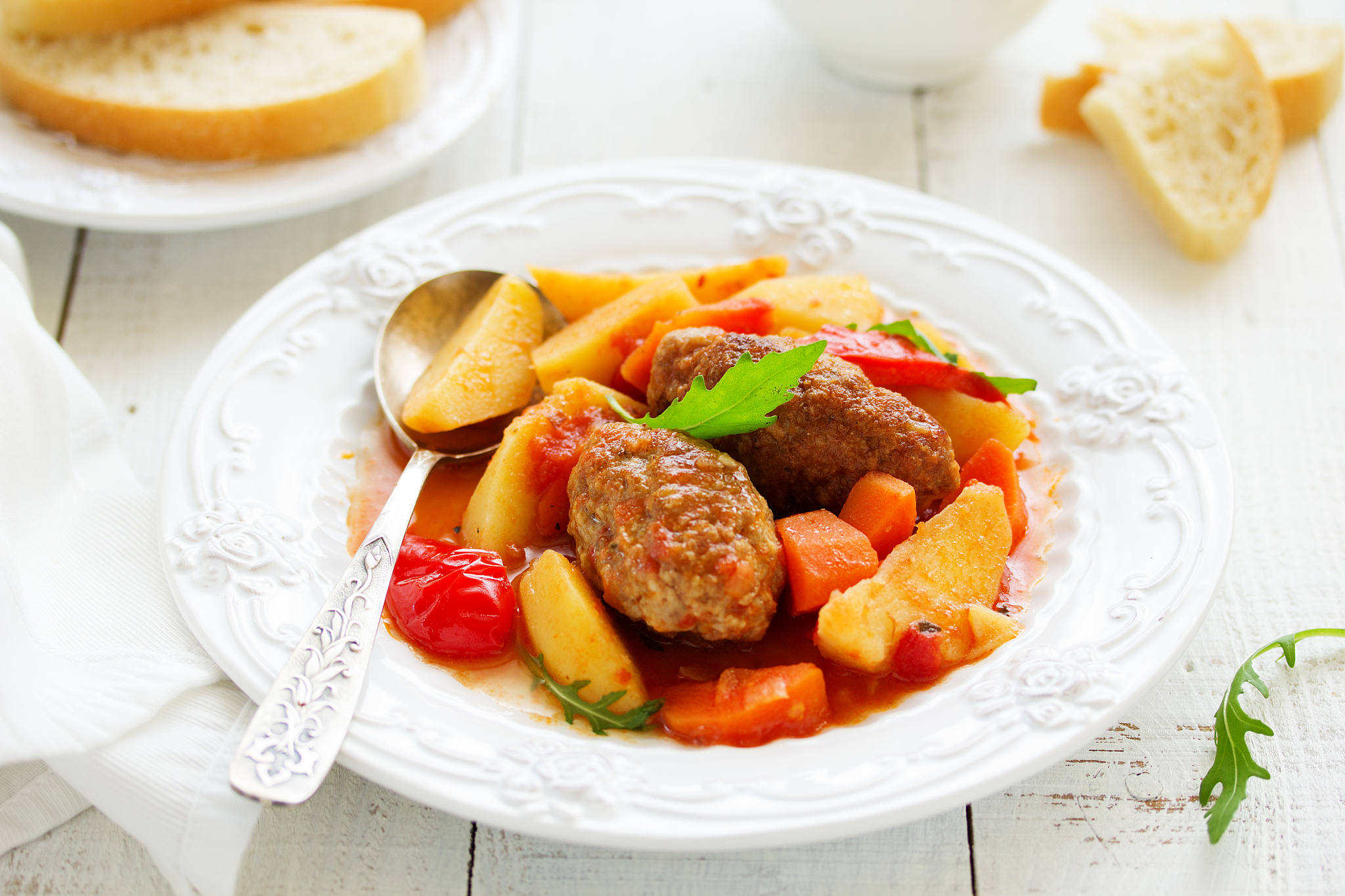 thick soup of meatballs with vegetables.