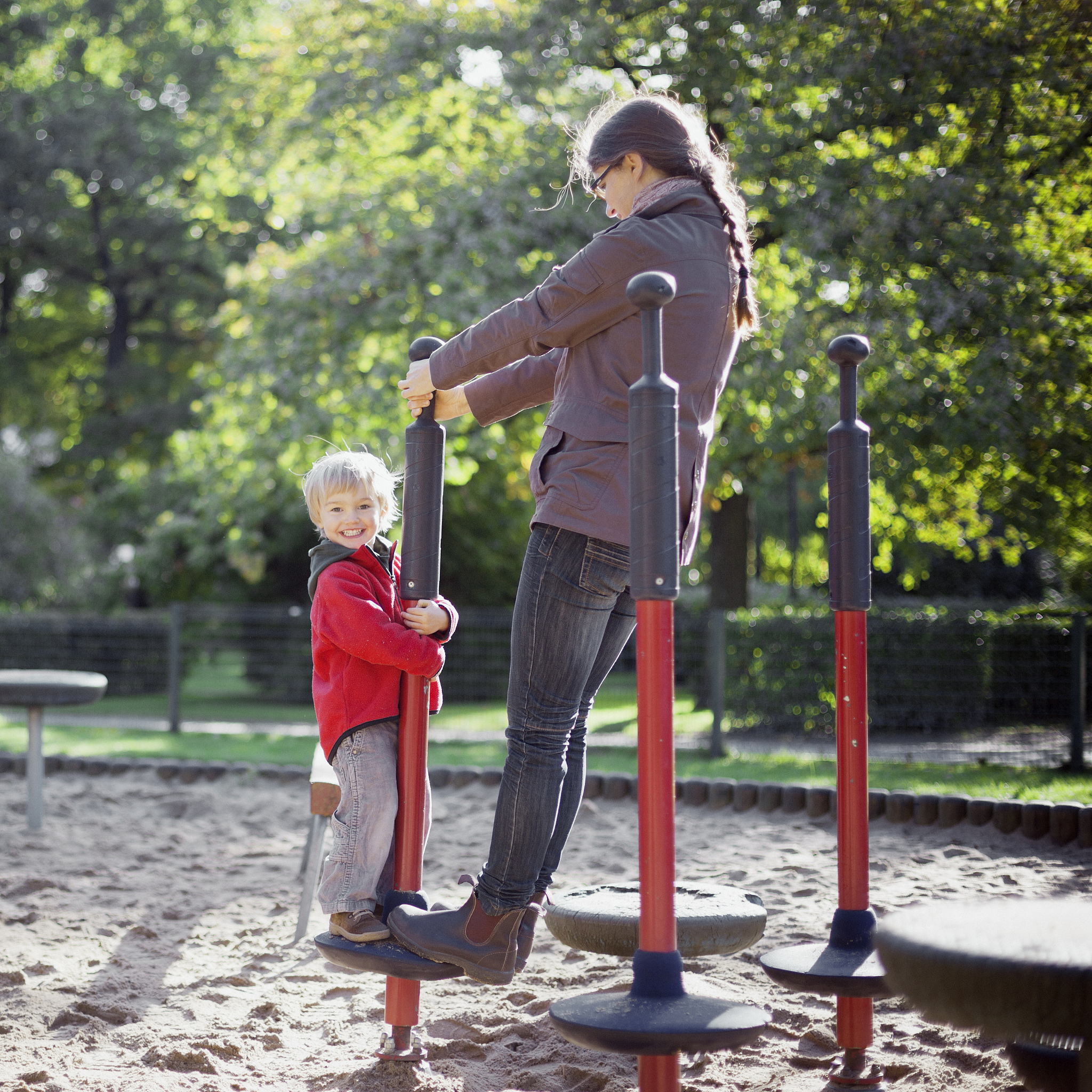 mother with son on playground