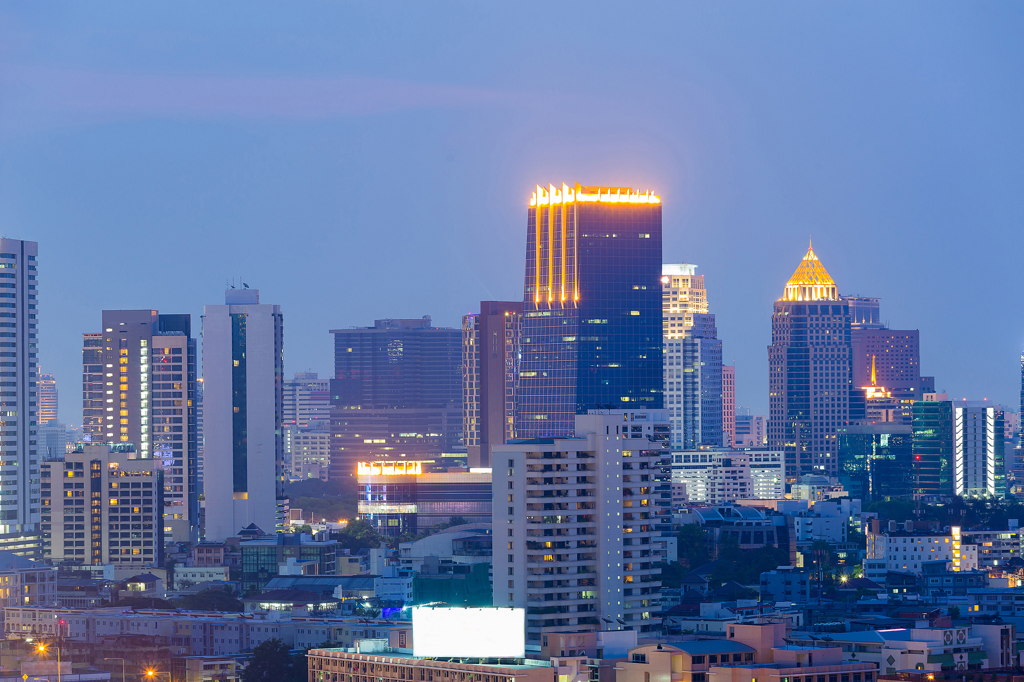 twilight sky over bangkok city office building