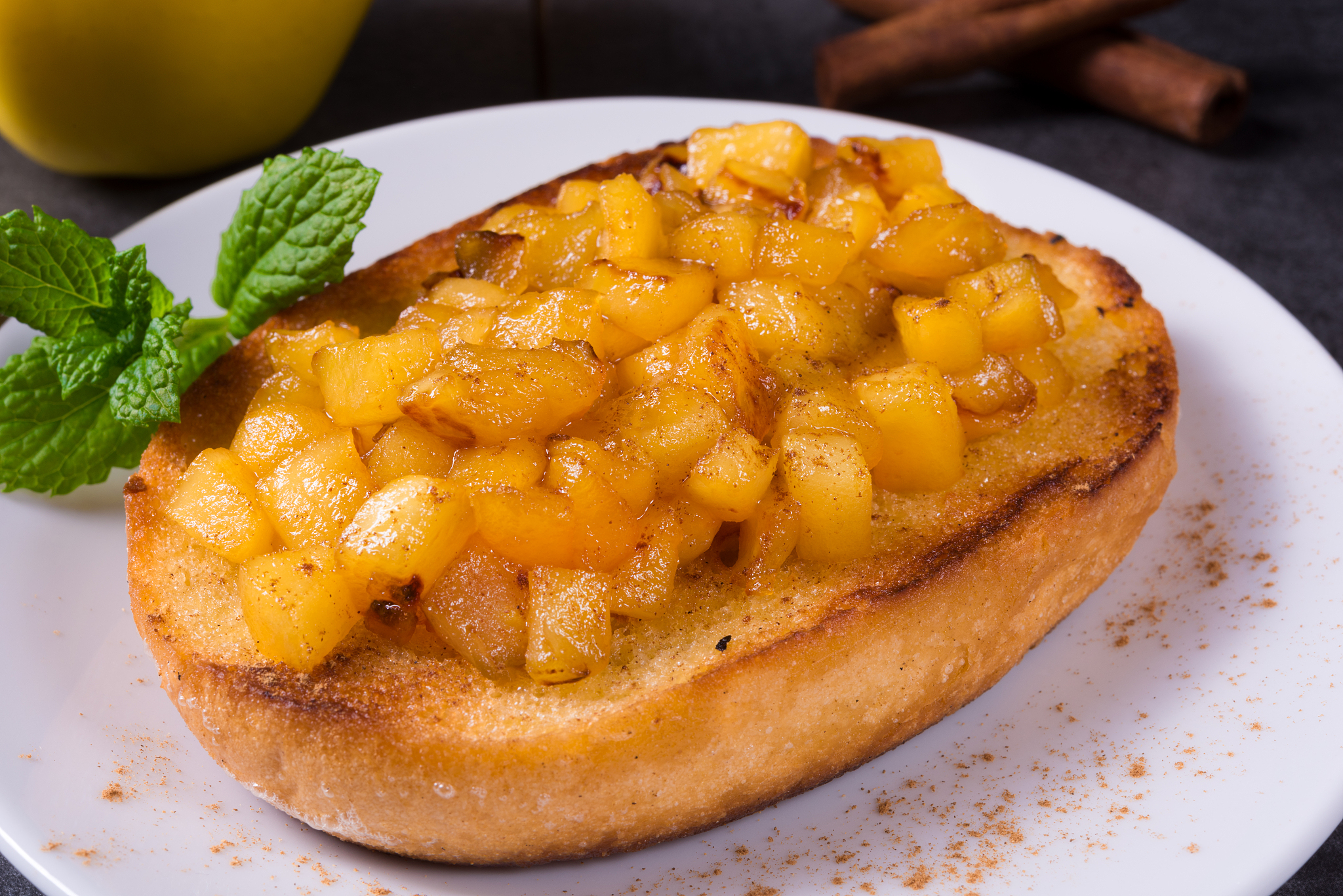 apple fruit spread with cinnamon and fruit pieces