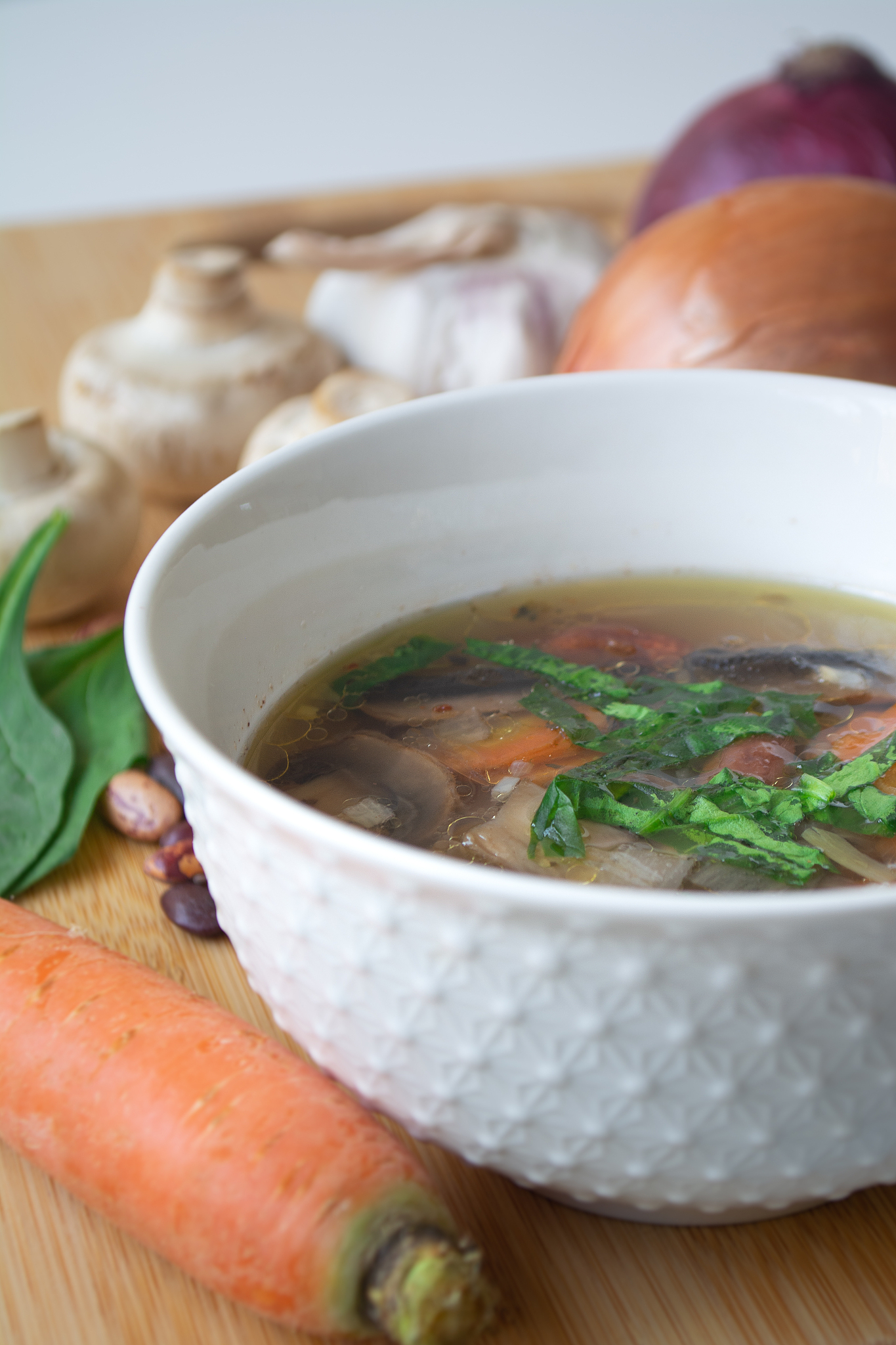 vegan soup with vegetables, mushrooms and beans