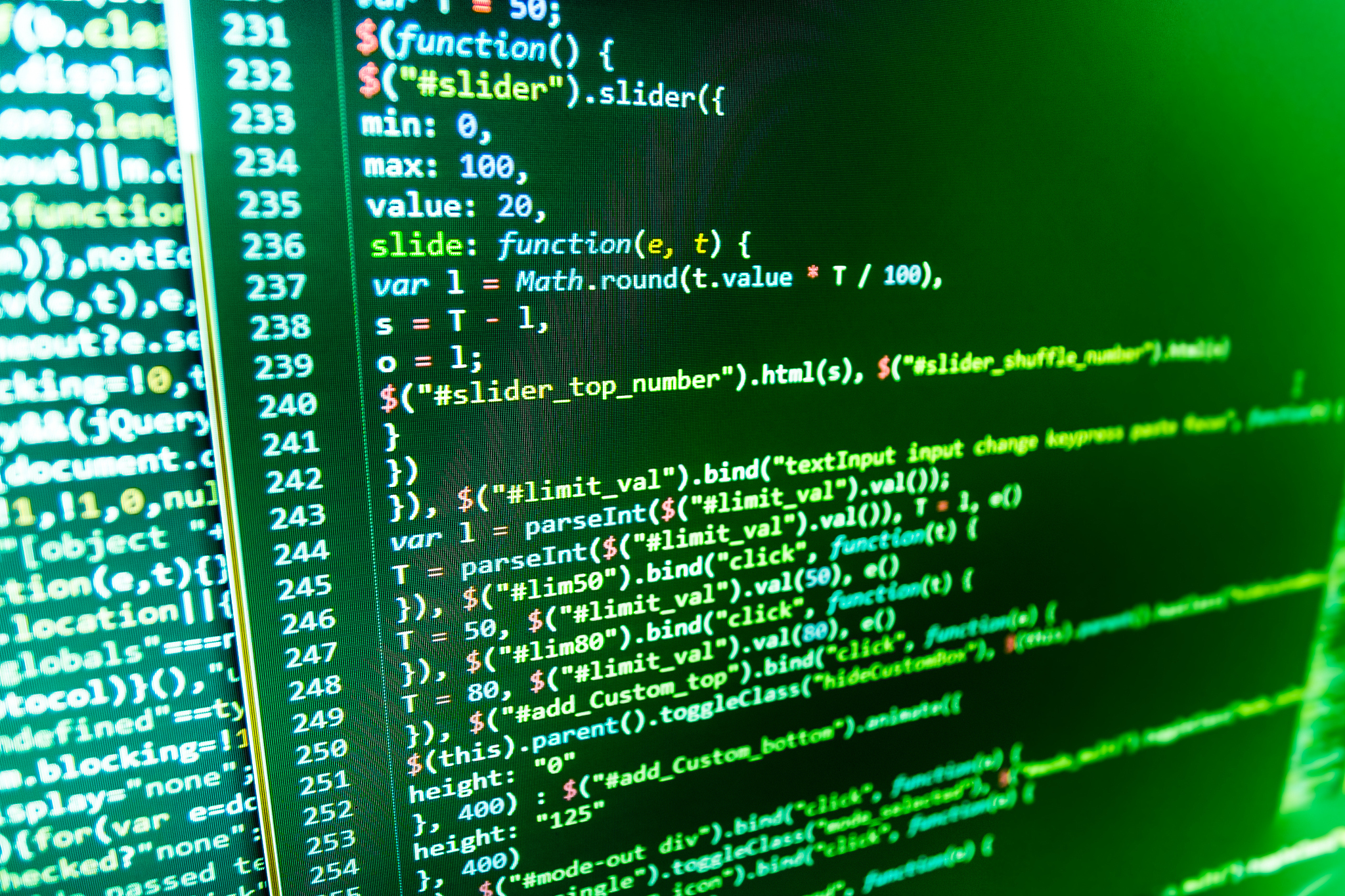 software developer programming code on computer