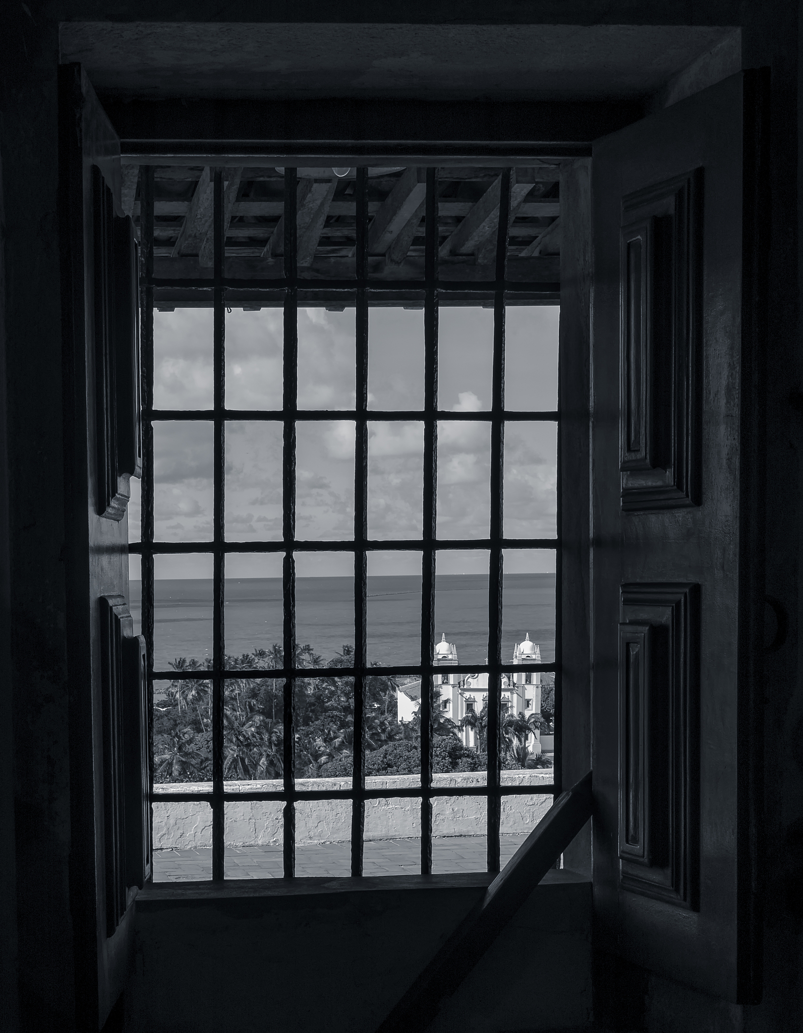 our lady of carmo seen from a window of another church in olinda