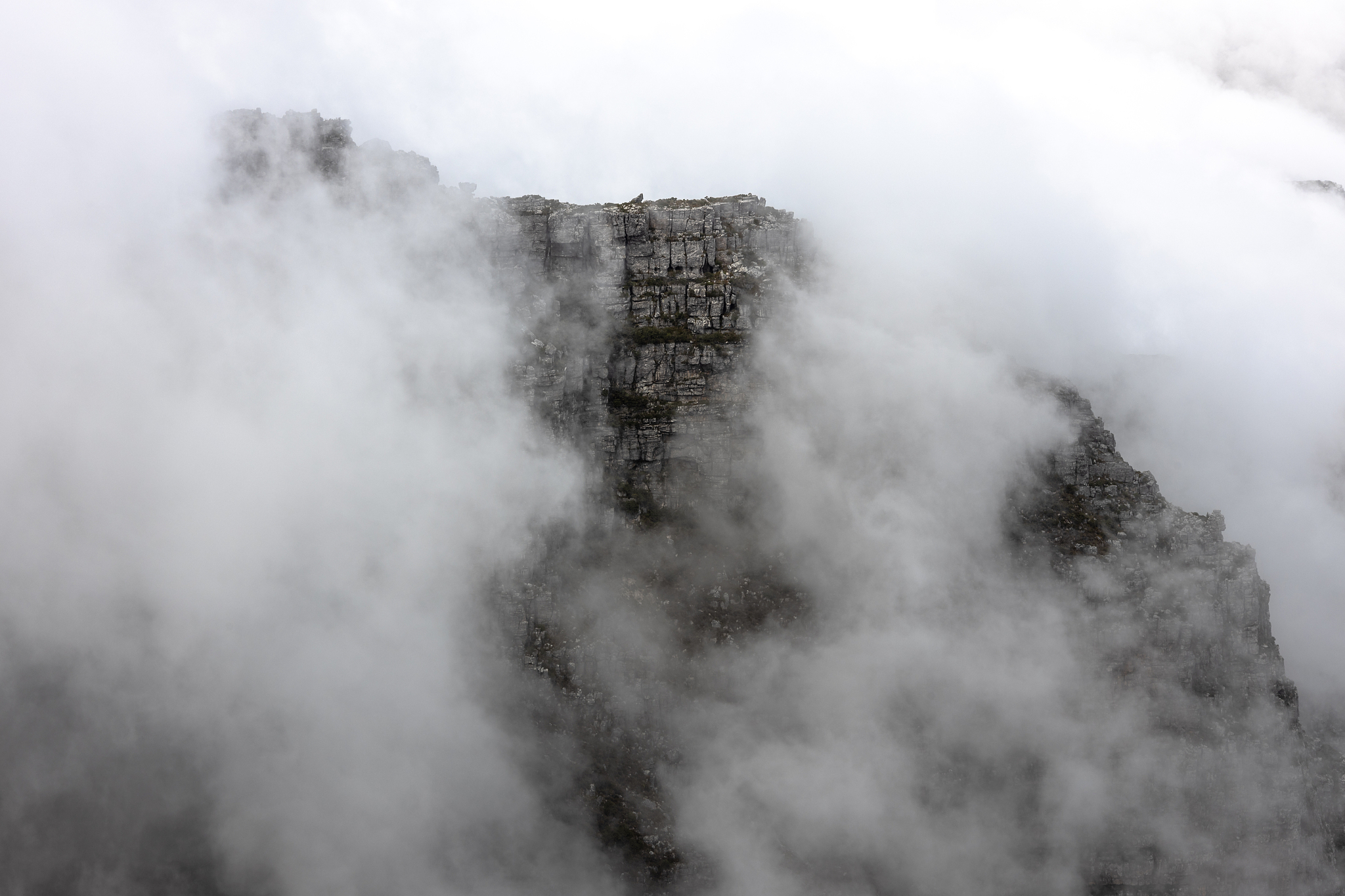 clouds rolling over table mountain in cape town, southafica. thi
