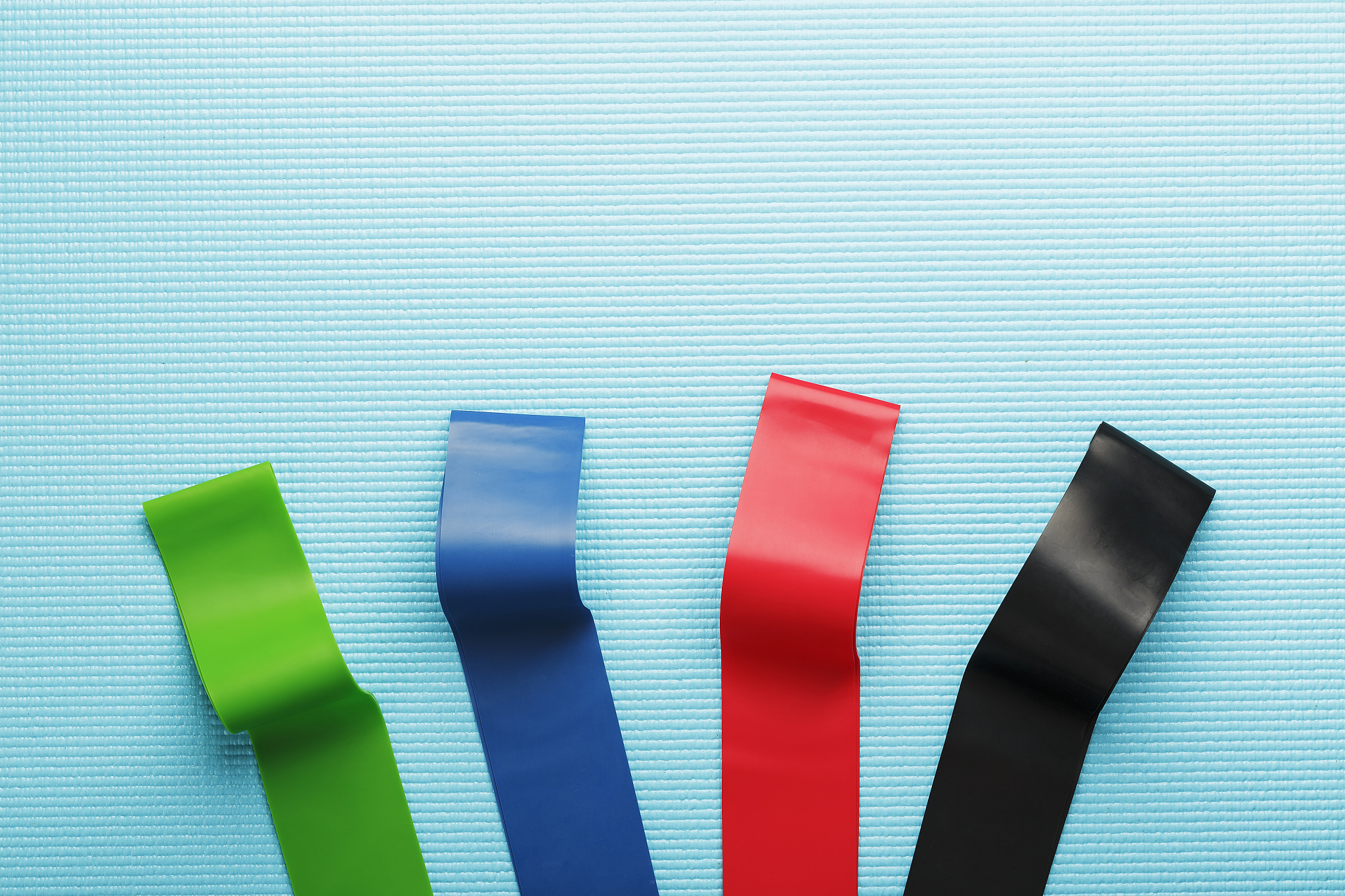 fitness elastic bands of different colors and loads for sports o