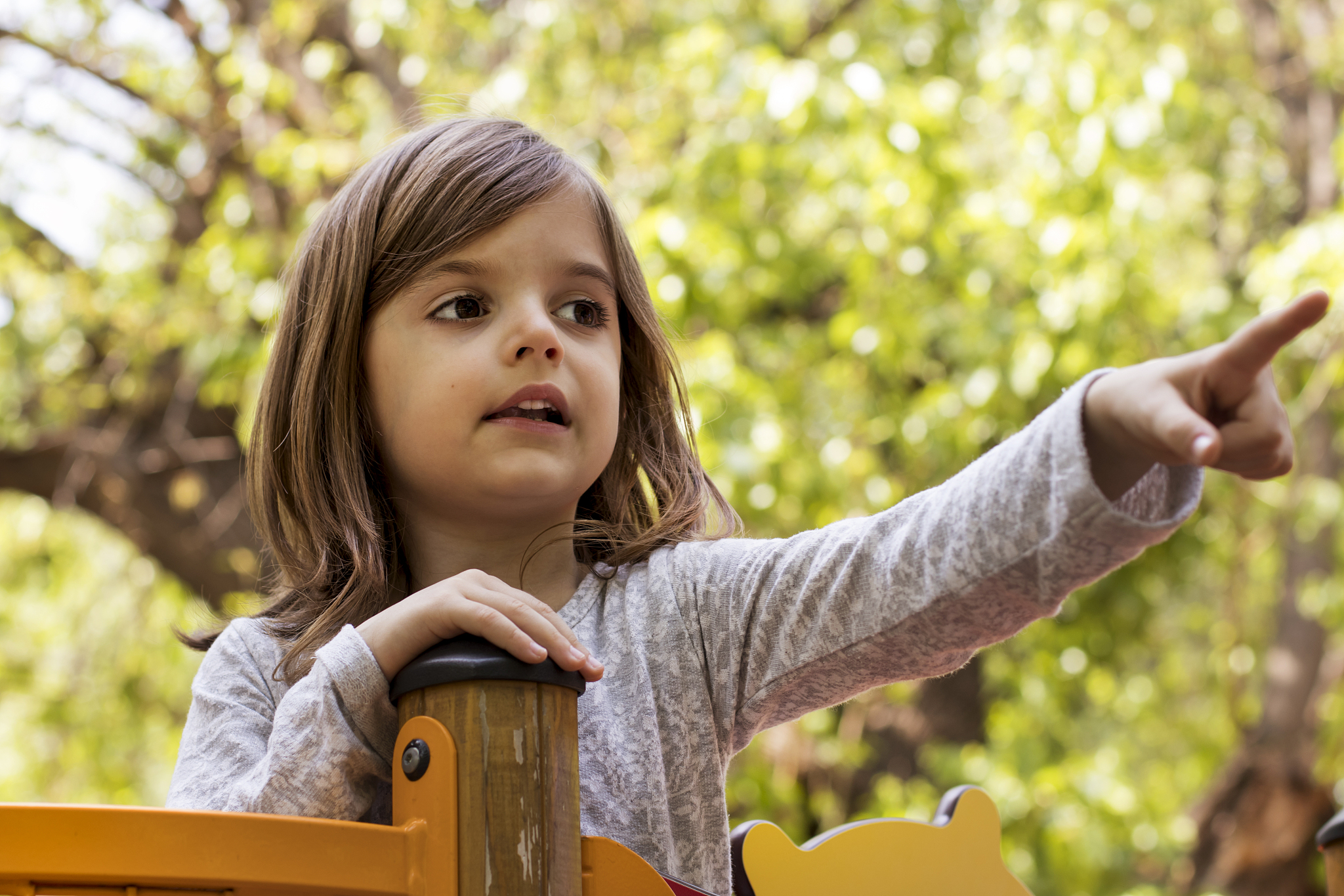 little girl pointing