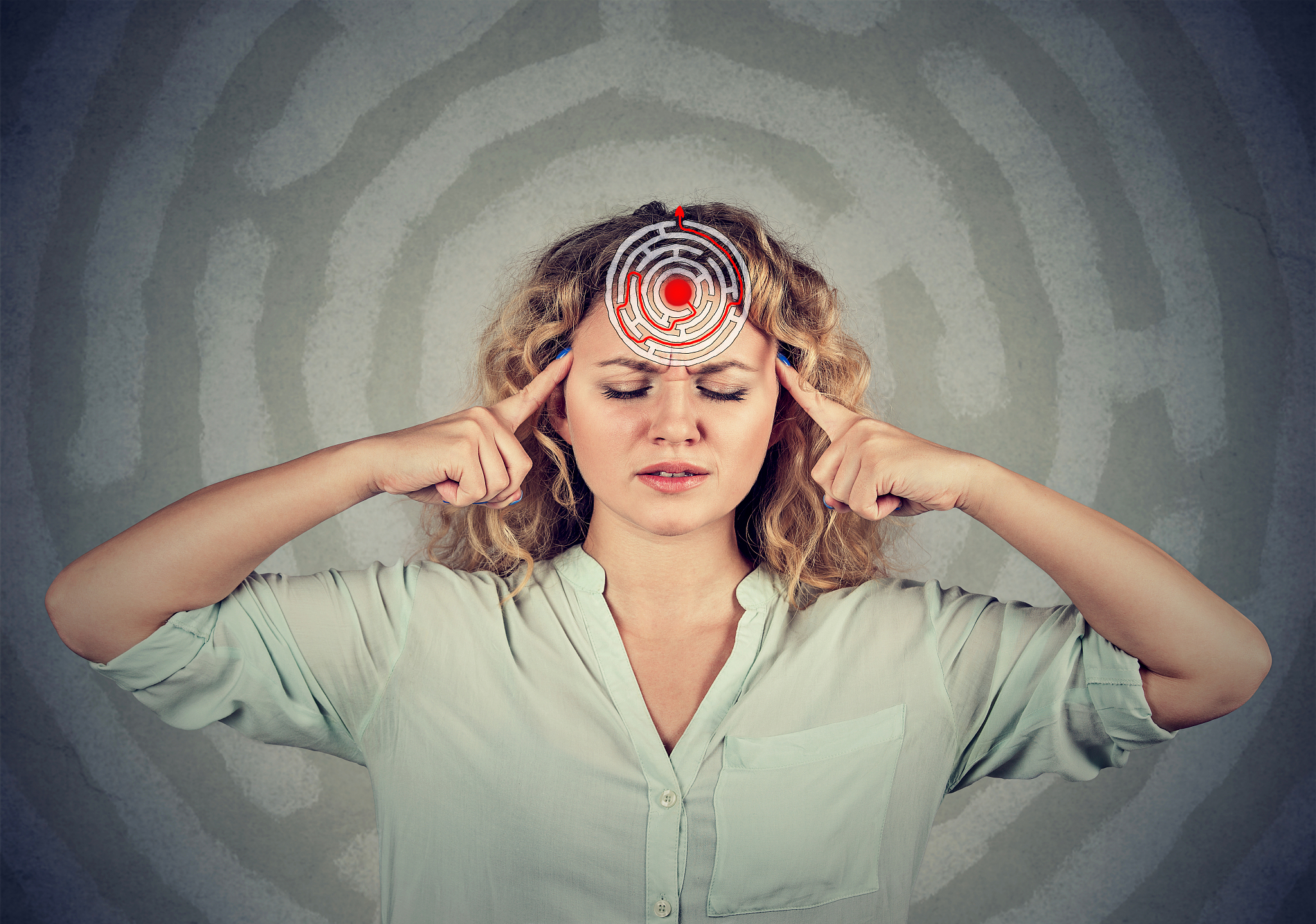 focused woman in maze of mind
