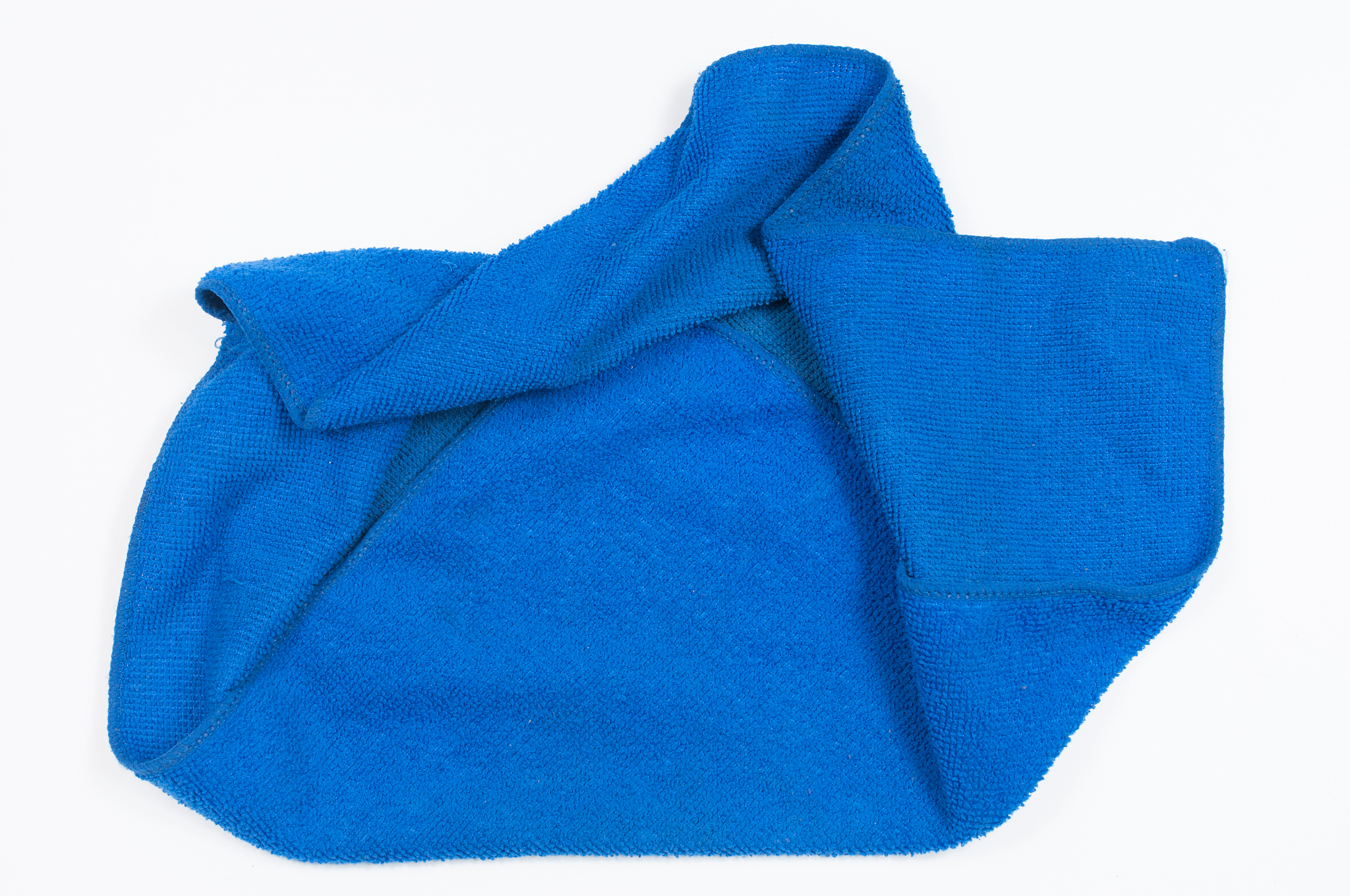 blue folded microfiber cloth isolated on white background