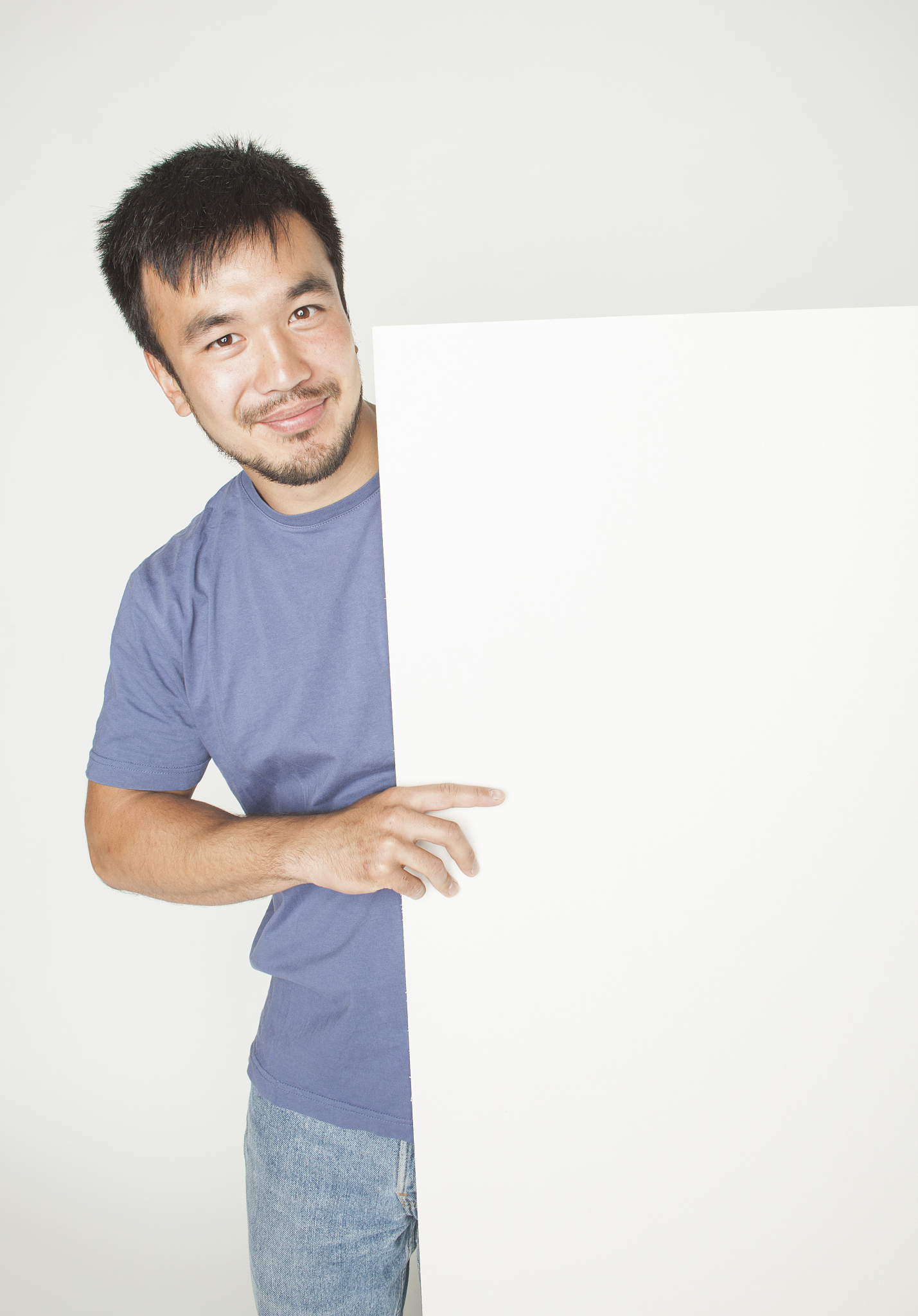 pretty cool asian man holding empty white plate smiling