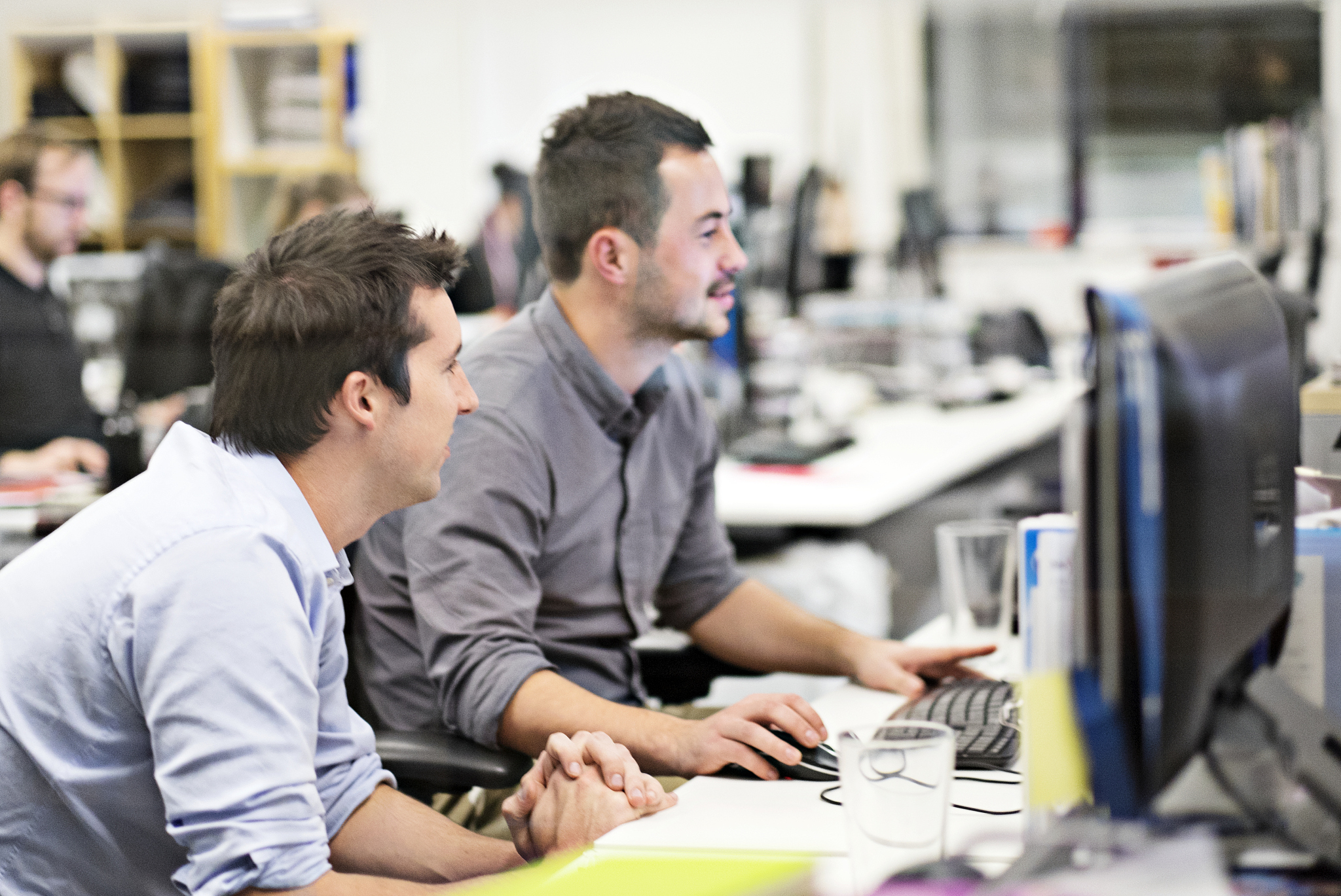 coworkers working at desk