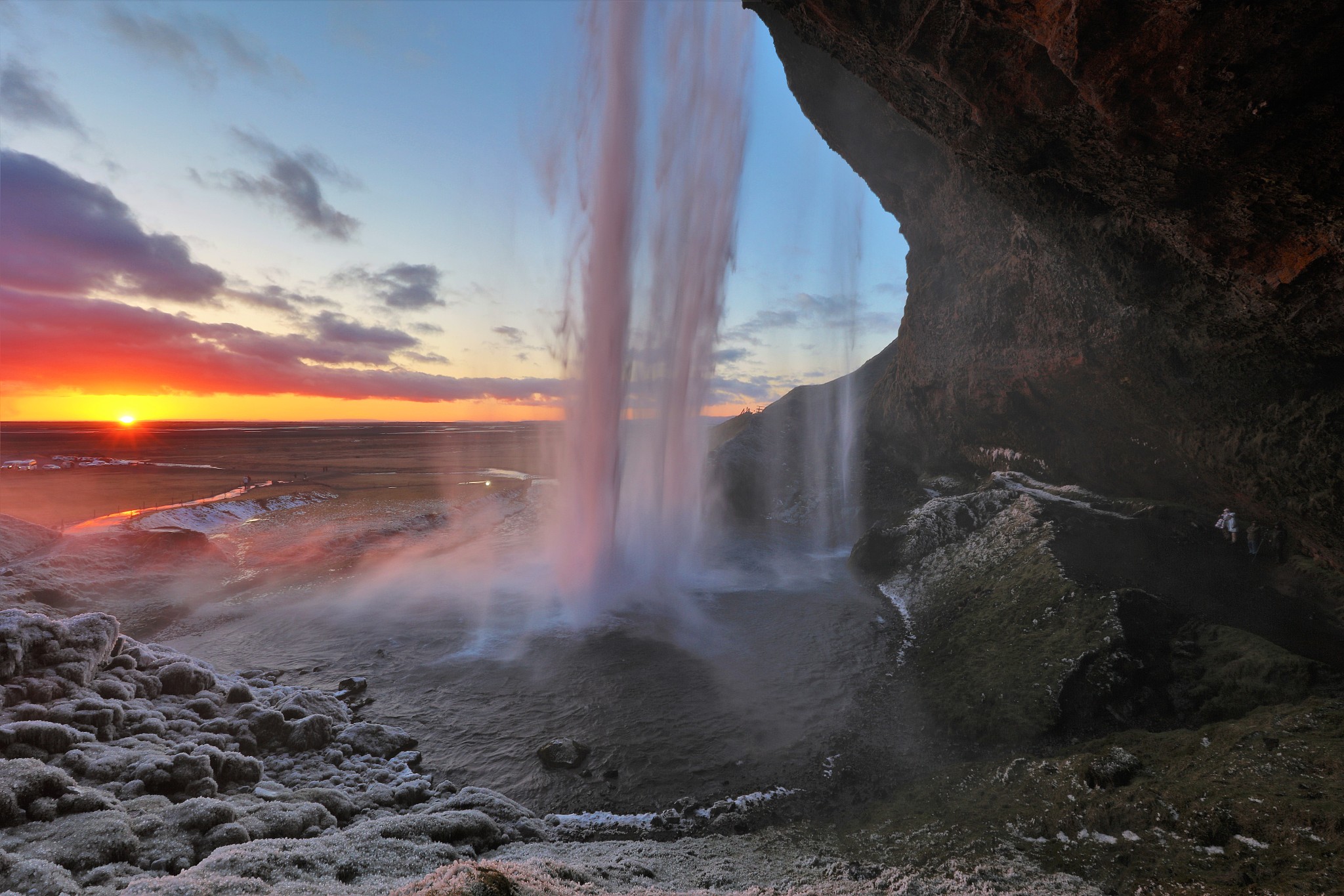 sunset at seljalandsfoss waterfall