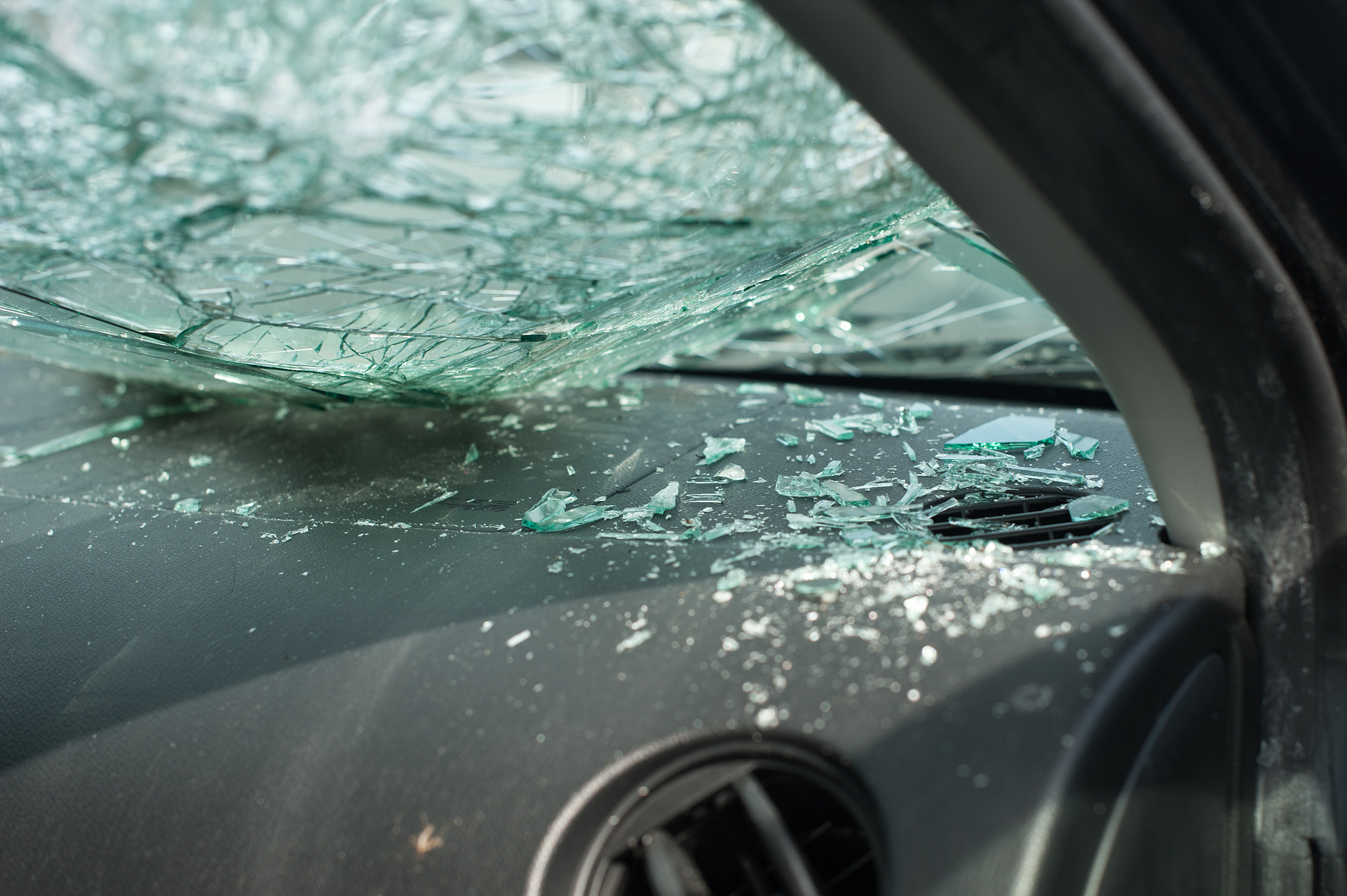 car crash accident on street, damaged car broken glass