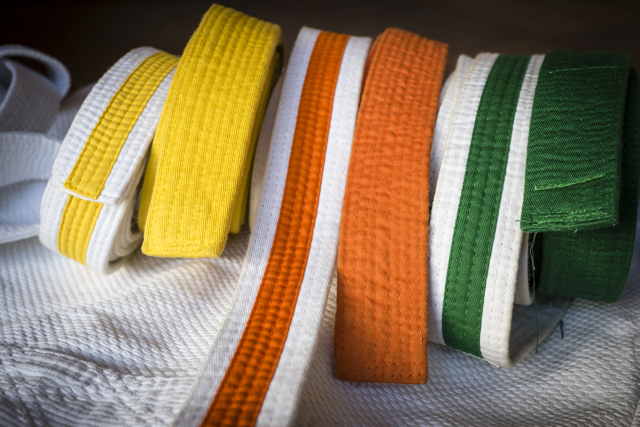 variety of karate belts in different colors