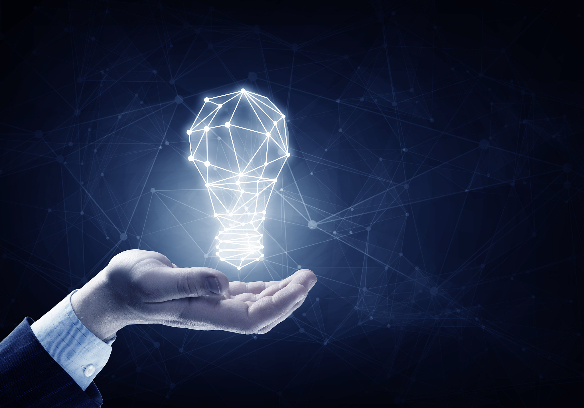 bright idea in hand. hands of business person holding illuminate