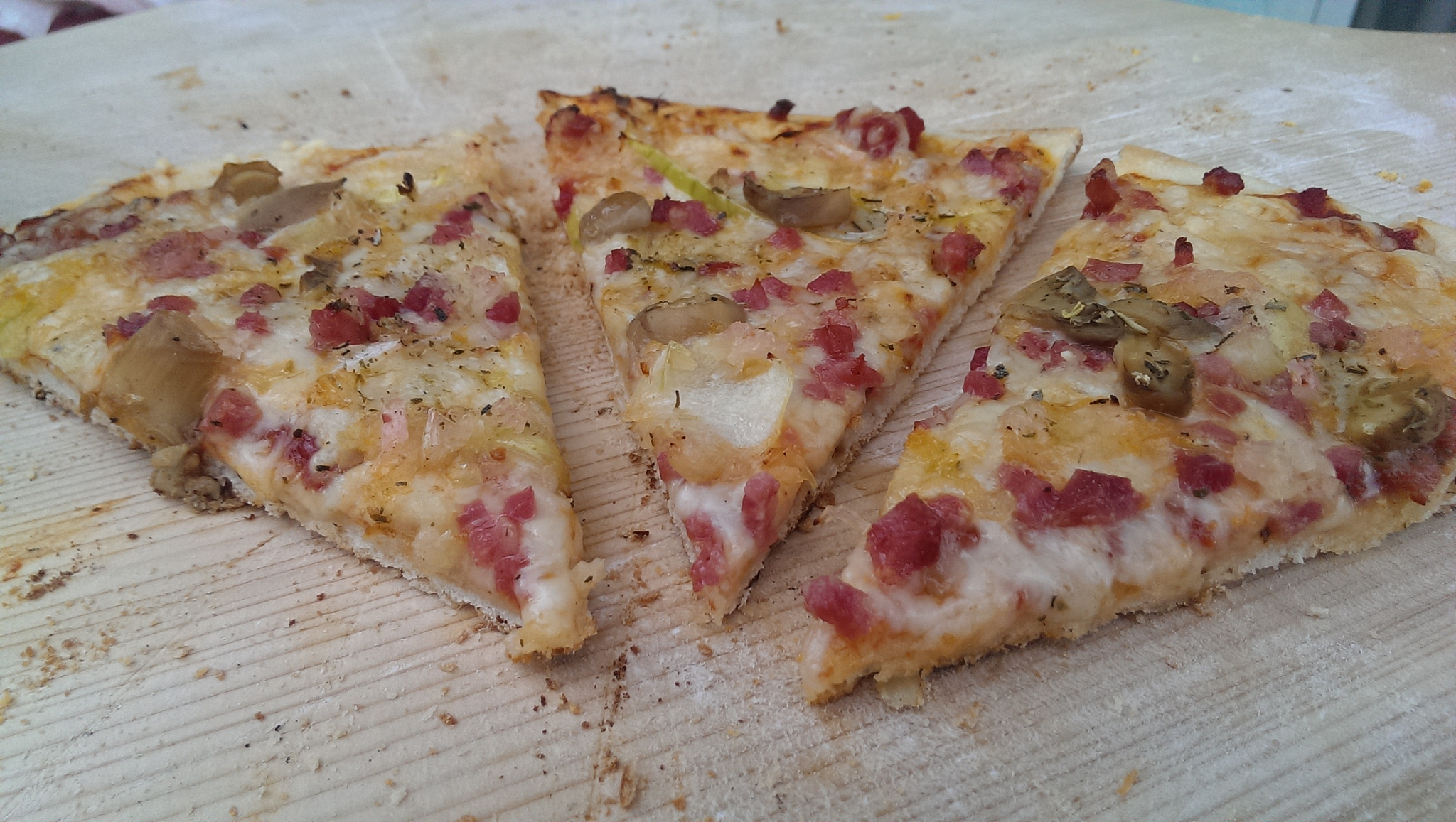 high angle view of pizza slices on table
