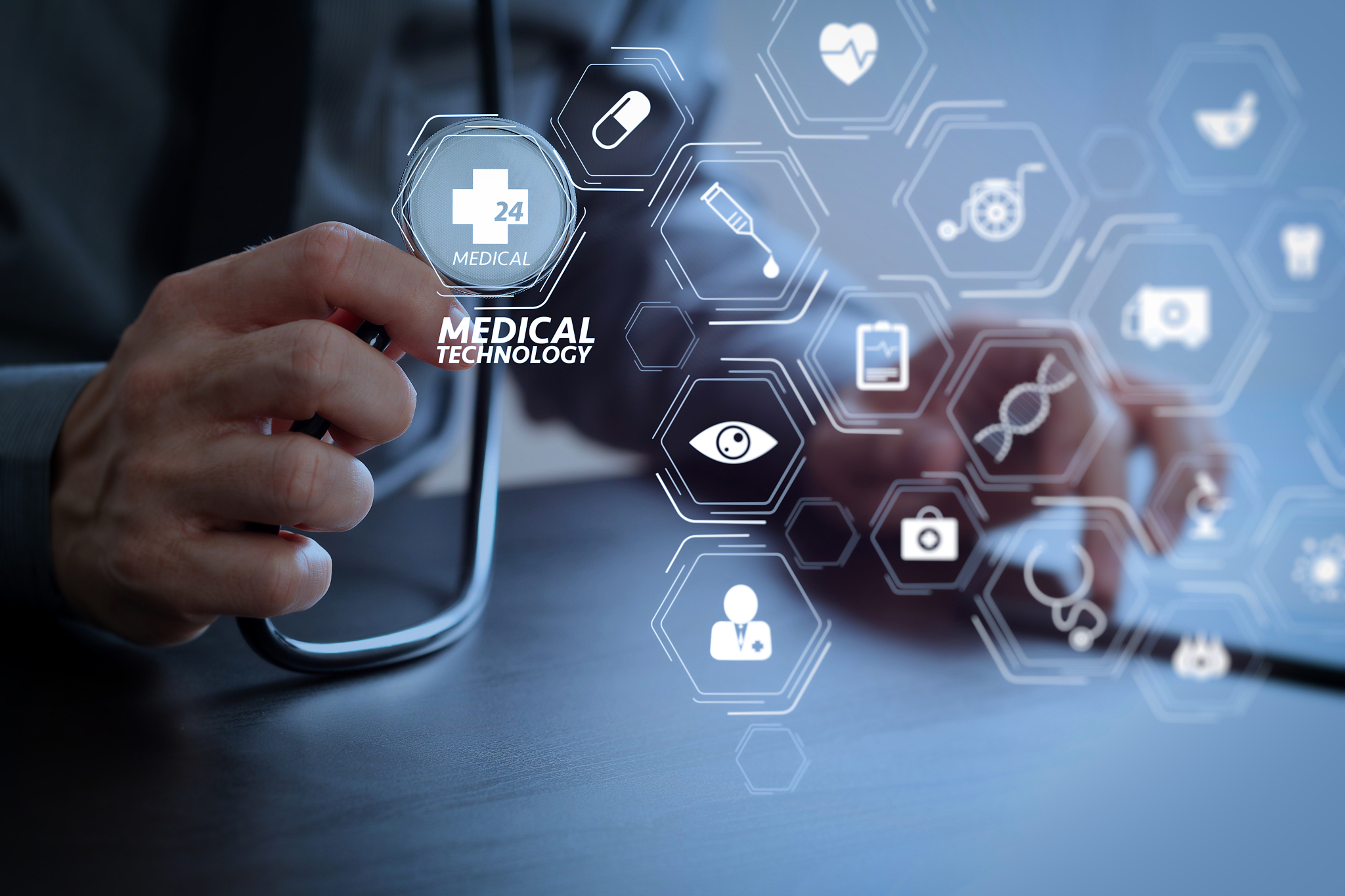 close up of smart medical doctor working with stethoscope and mo