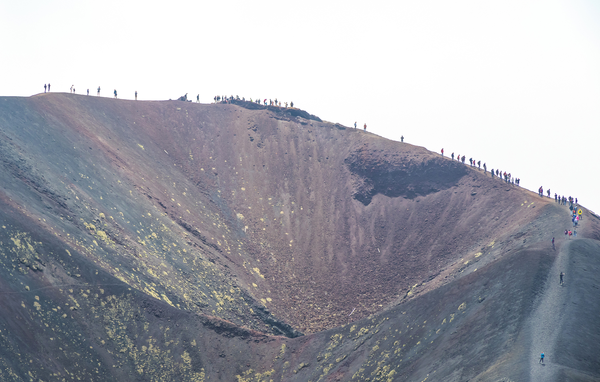 hiking on mount etna, etna national park, sicily, italy