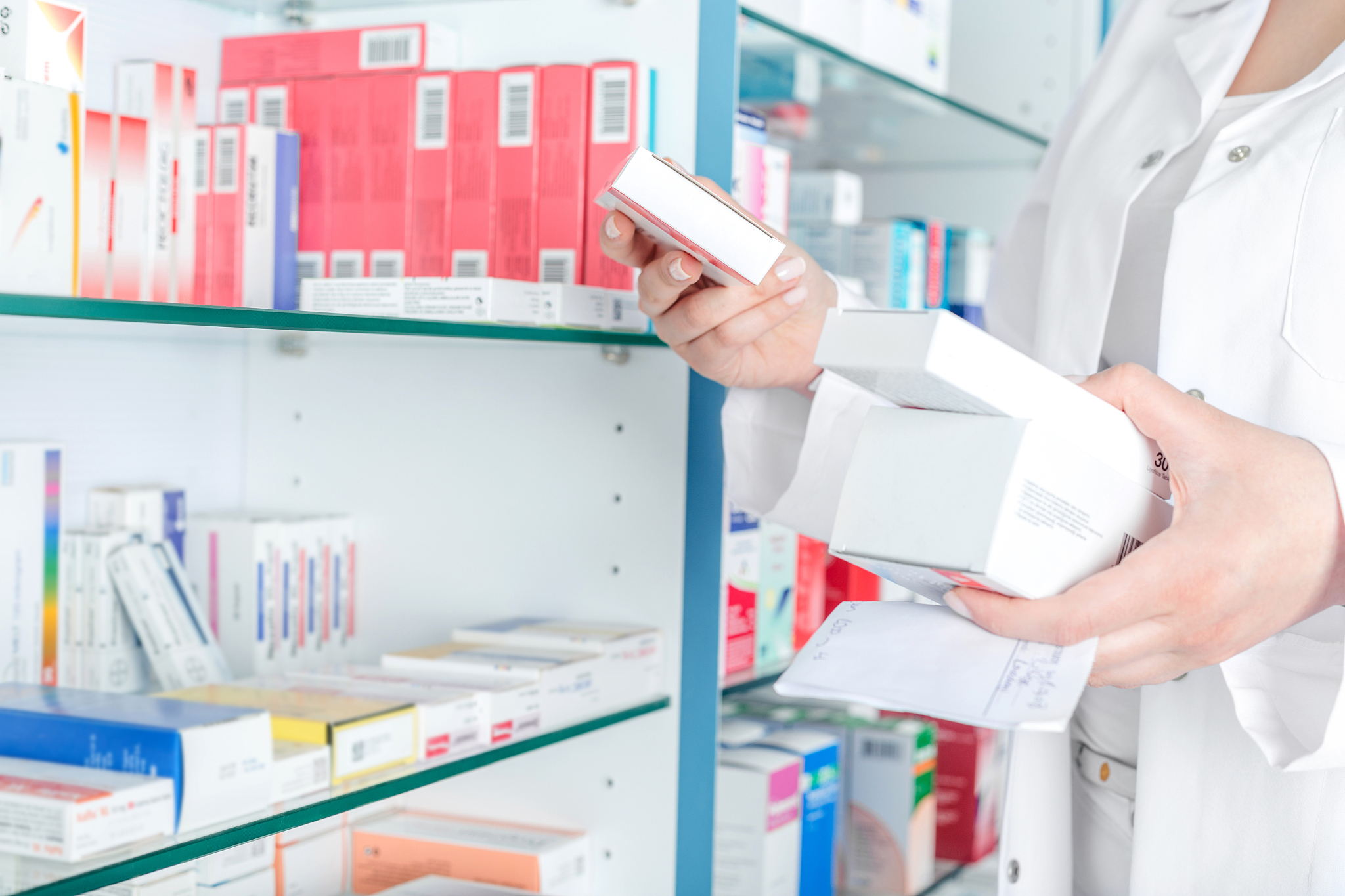 pharmacist holding medicine box