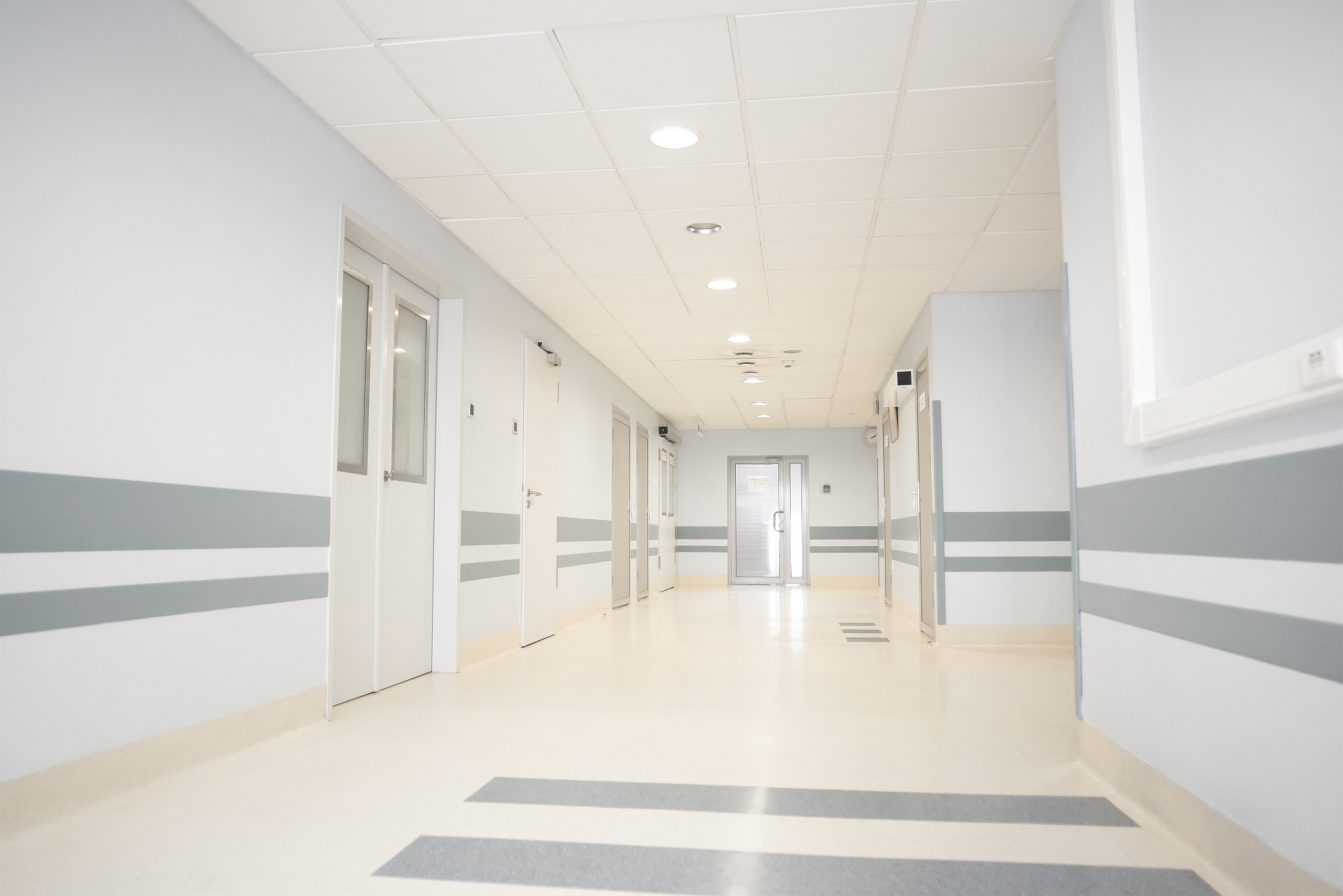 a long light corridor in a modern hospital